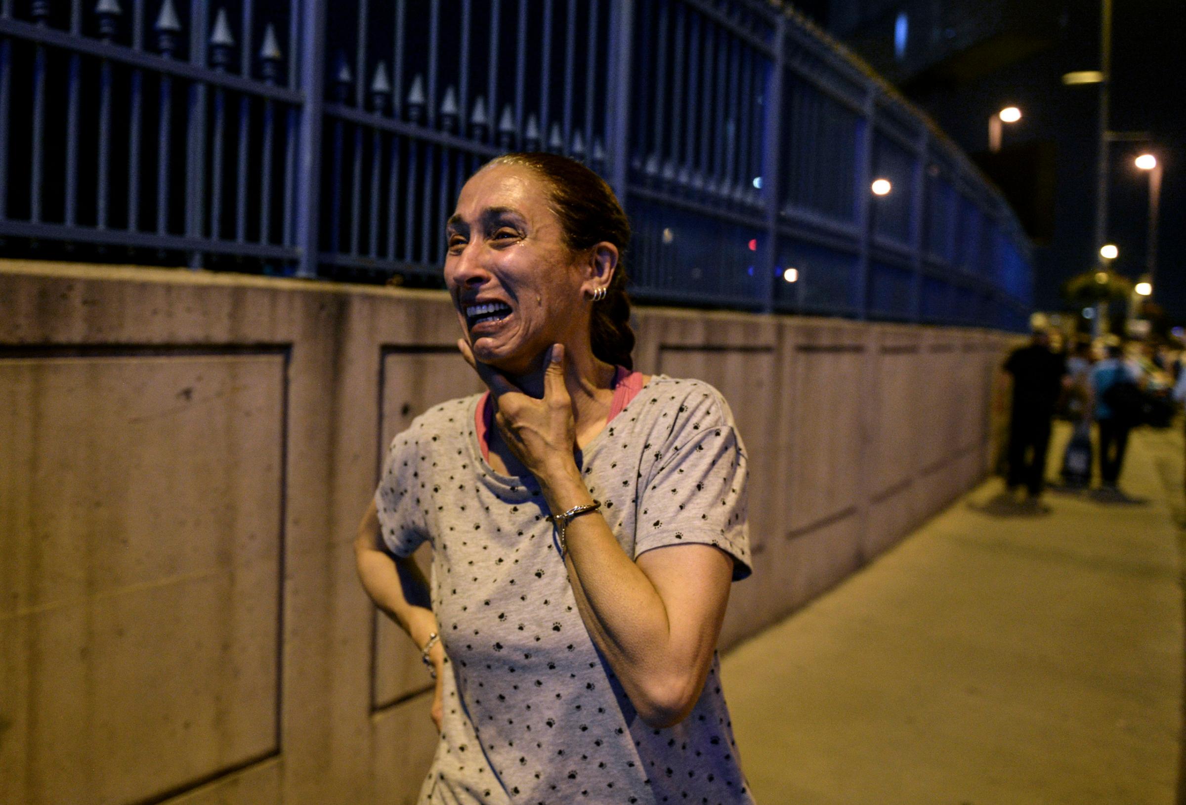 A woman cries outside Istanbul's Ataturk airport following an attack on June 28, 2016.