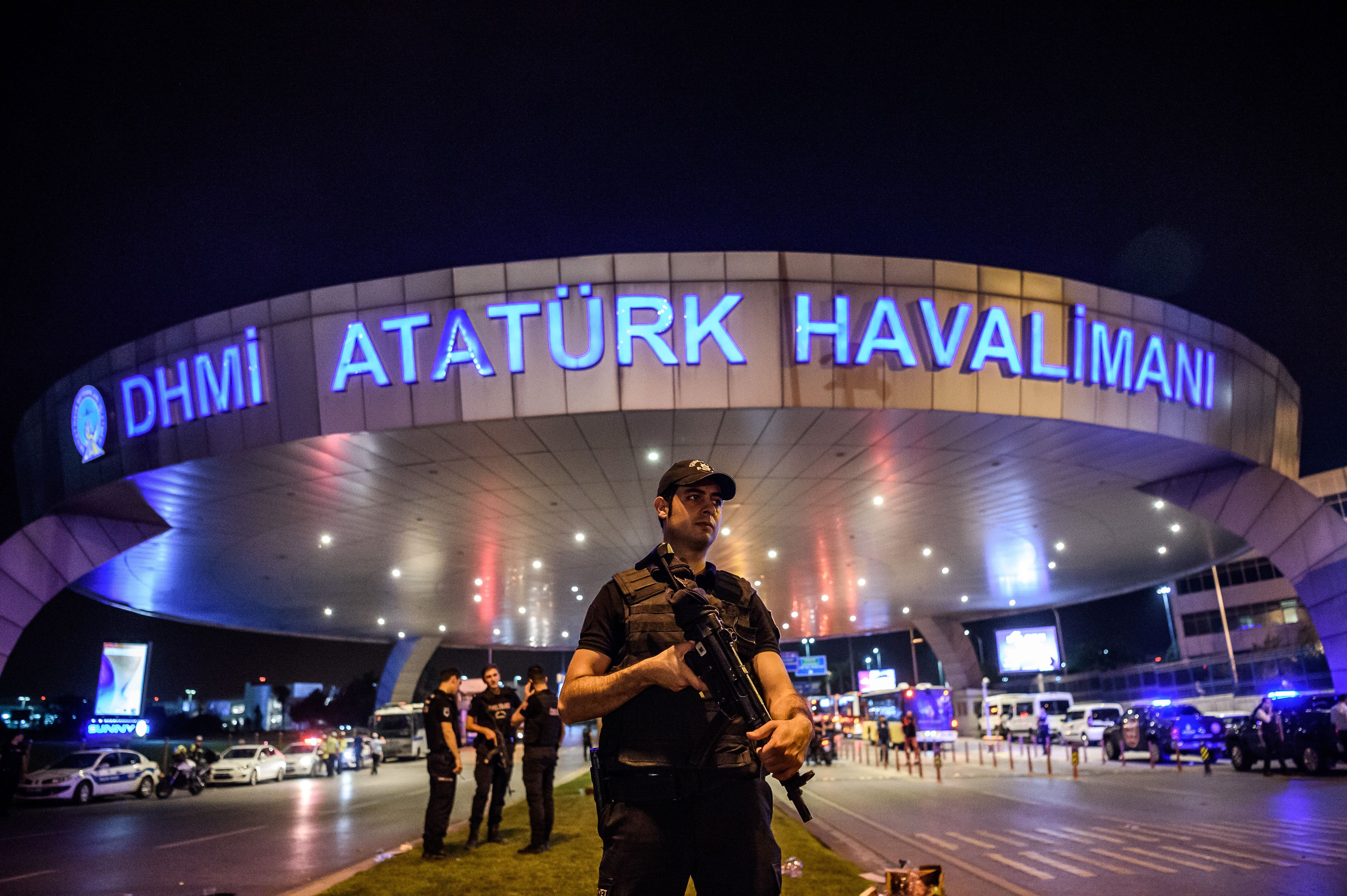A Turkish riot police officer patrols Ataturk airport's main enterance in Istanbul, on June 28, 2016. (Ozan Kose—AFP/Getty Images)