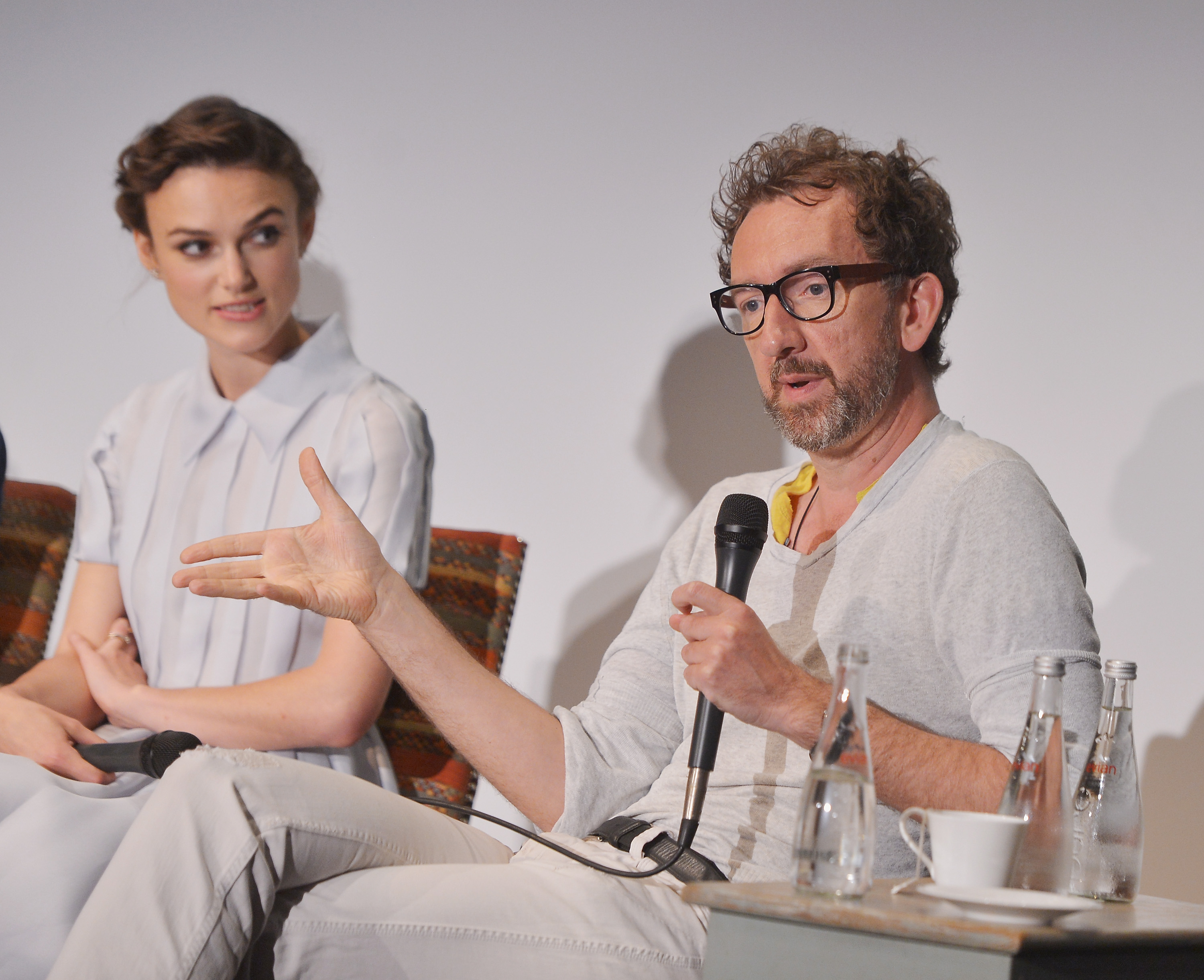 Actress Keira Knightley and writer/director John Carney attend the 'Begin Again' press conference at Crosby Street Hotel on June 26, 2014 in New York City. (Stephen Lovekin—Getty Images for HBO)