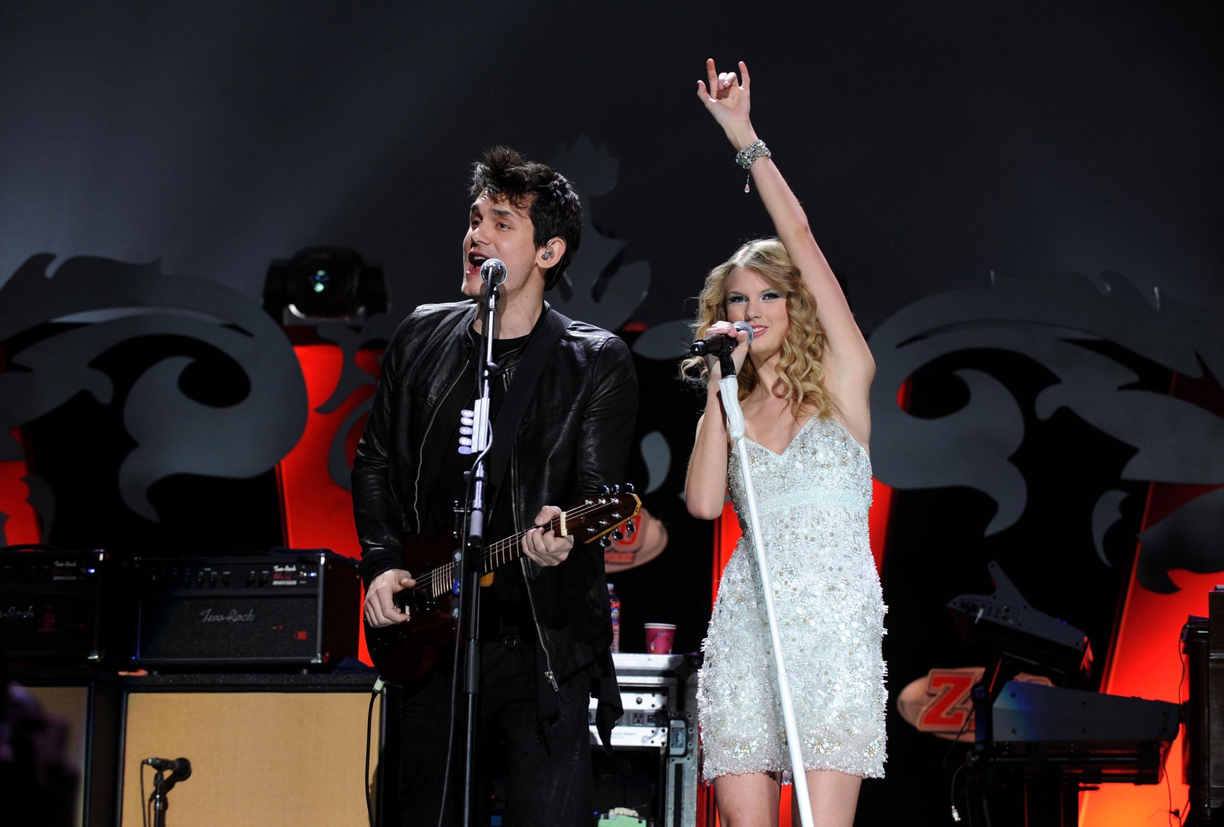 John Mayer and Taylor Swift perform onstage during Z100's Jingle Ball 2009 presented by H&amp;M at Madison Square Garden on December 11, 2009 in New York City. (Photo by Theo Wargo/WireImage)
