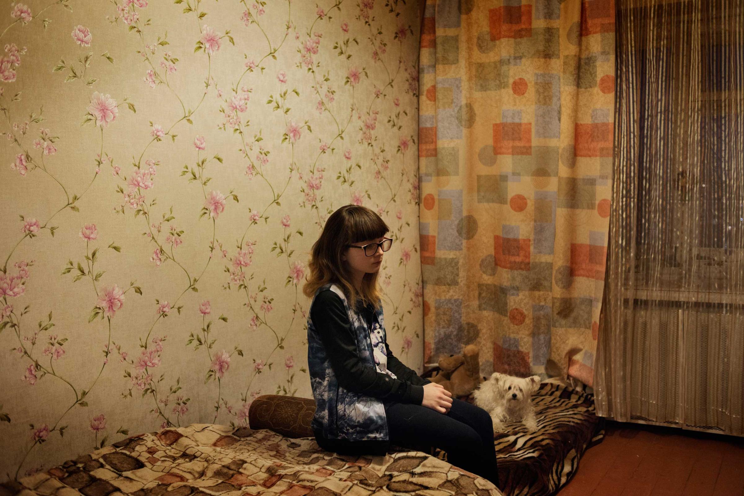 Diana in the flat where she's living with her grandmother. Her mother Zhanna died in 2015 due to the long use of Krokodil.
