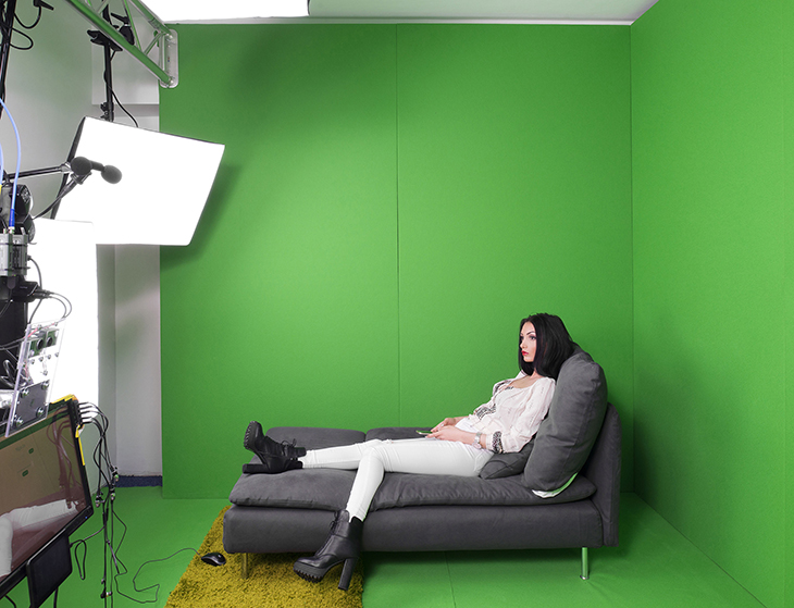 A 25-year-old cam model in the virtual reality room at Studio 20 before her night shift, Bucharest, Romania, March 2016.