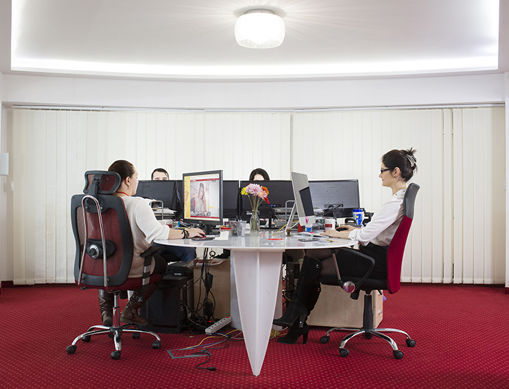 A group of operators at work in the office of Studio 20 in Bucharest, Romania, March 2016.
