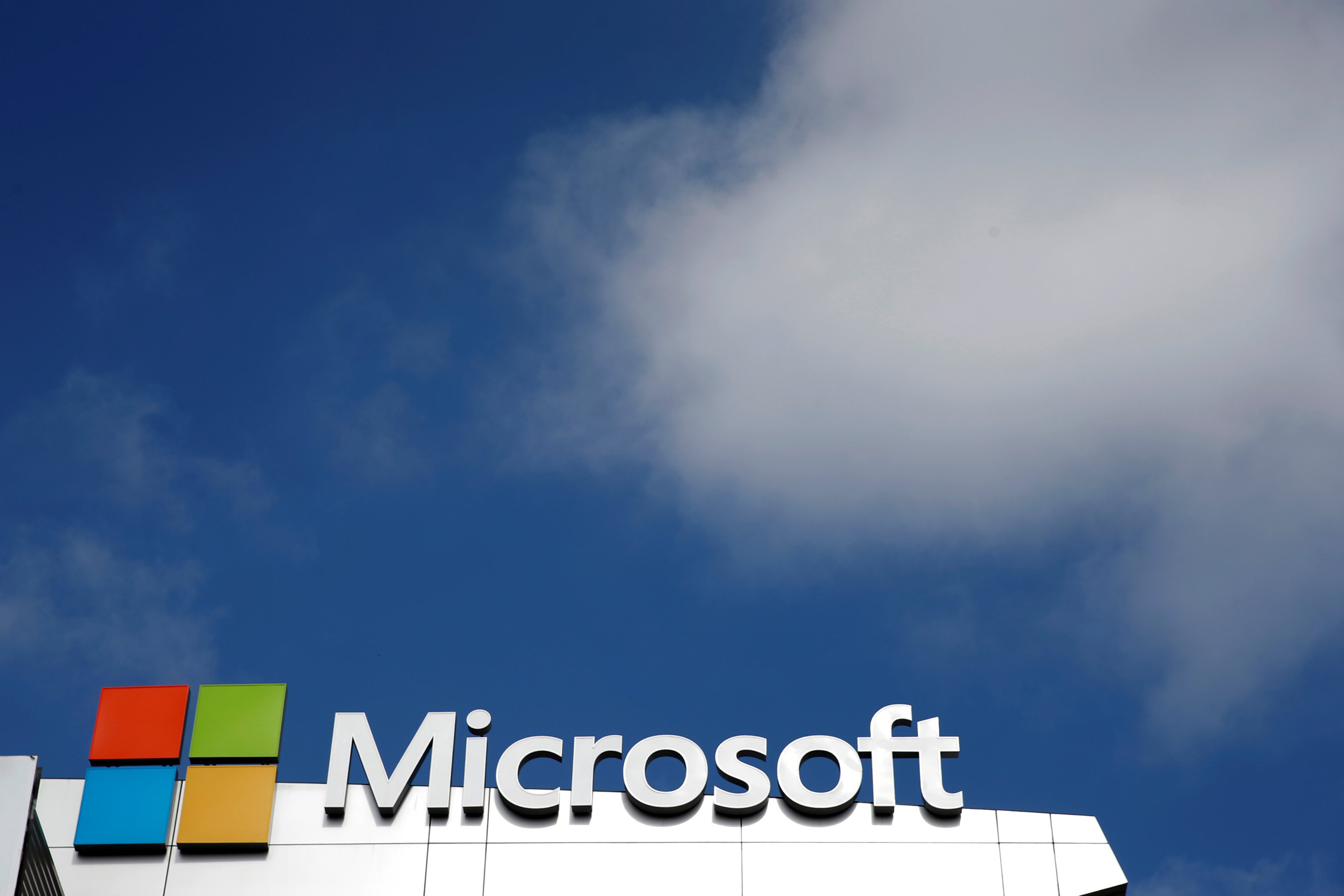 A Microsoft logo is seen next to a cloud the day after Microsoft Corp's $26.2 billion purchase of LinkedIn Corp, in Los Angeles on June 14, 2016. (Lucy Nicholson—Reuters)