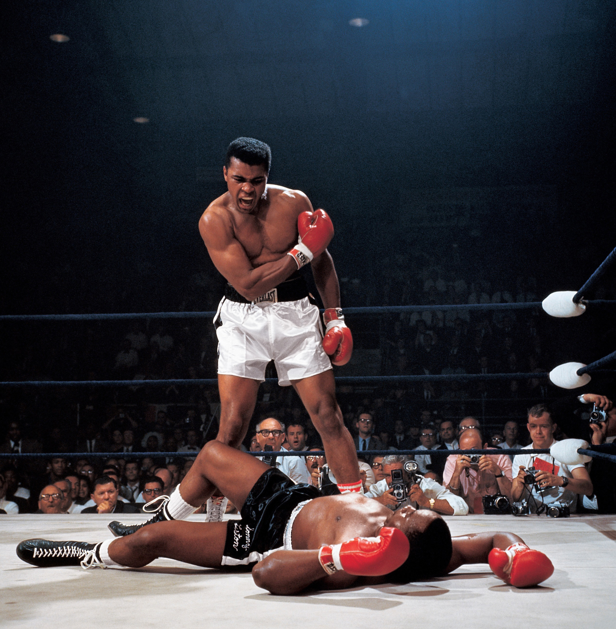 Muhammad Ali after first round knockout of Sonny Liston during World Heavyweight Title fight at St. Dominic's Arena in Lewiston, Maine on 5/25/1965. (Neil Leifer—Sports Illustrated)