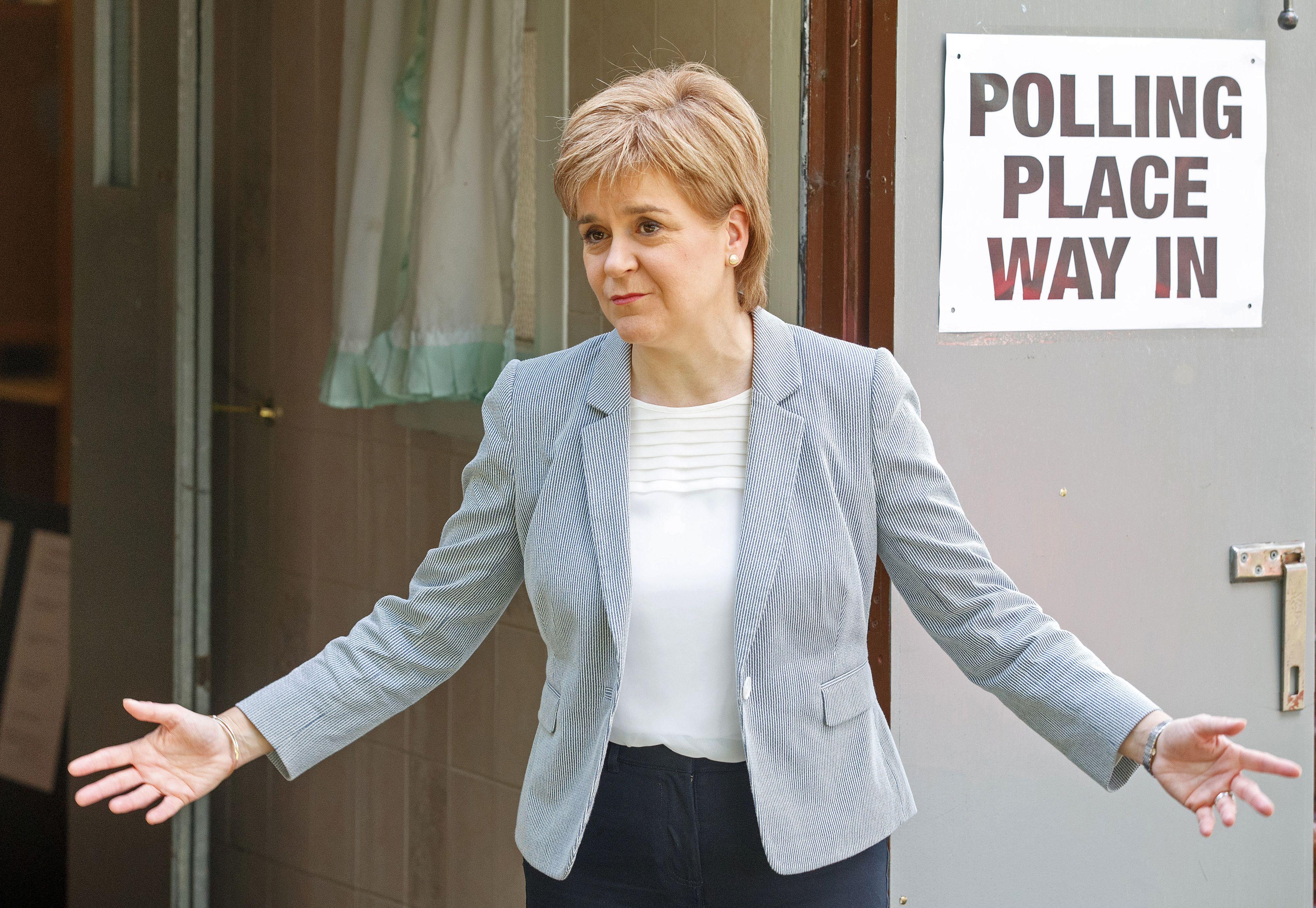 Scotland's First Minister and Leader of the Scottish National Party (SNP), Nicola Sturgeon, reacts as leaves after voting at a polling station at Broomhouse Community Hall in east Glasgow, on June 23, 2016. (Robert Perry—AFP/Getty Images)