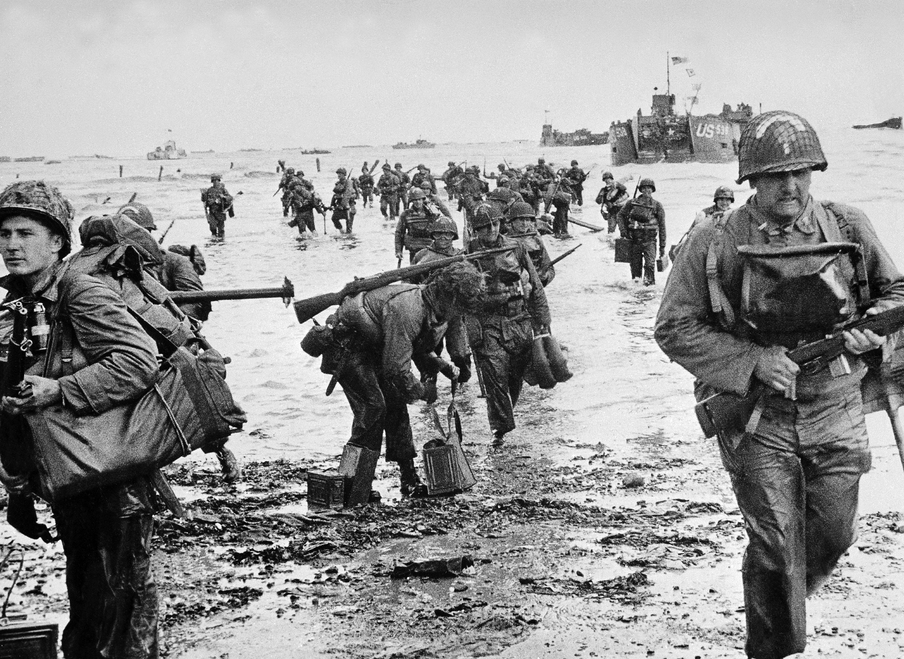 American soldiers, their feet in water, land on a Normandy beach on June 6, 1944. (Keystone-France—Gamma-Keystone/Getty Images)