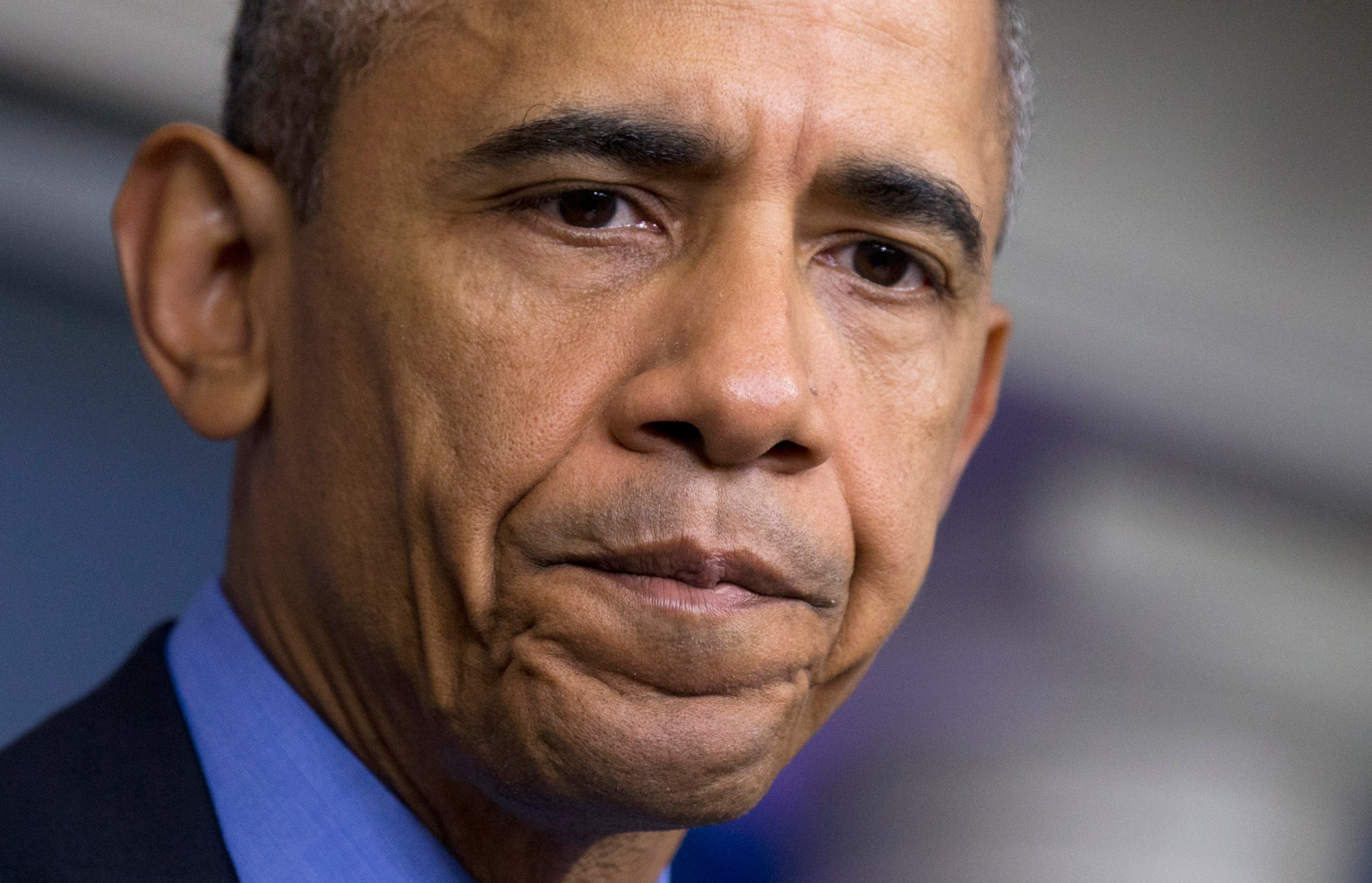 FILE - In this June 18, 2015 photo, President Barack Obama pauses while speaking in the Brady Press Briefing Room of the White House in Washington, on the church shooting in Charleston, S.C., prior to his departure to Los Angeles. After nine black parishioners were slain at a Charleston church, South Carolina did what many thought would never happen: It moved the Confederate flag off Statehouse grounds. But a year later, little has changed in Charleston. (AP Photo/Manuel Balce Ceneta, File)