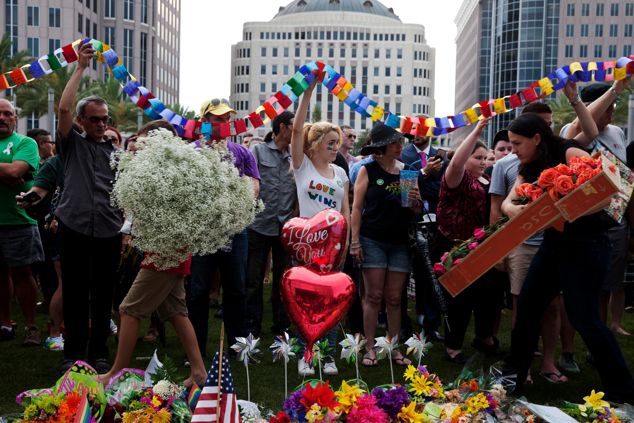 A memorial honors victims of the Pulse nightclub shooting at the Dr. Phillips Center for Performing Arts in Orlando, Fla., on June 13, 2016.