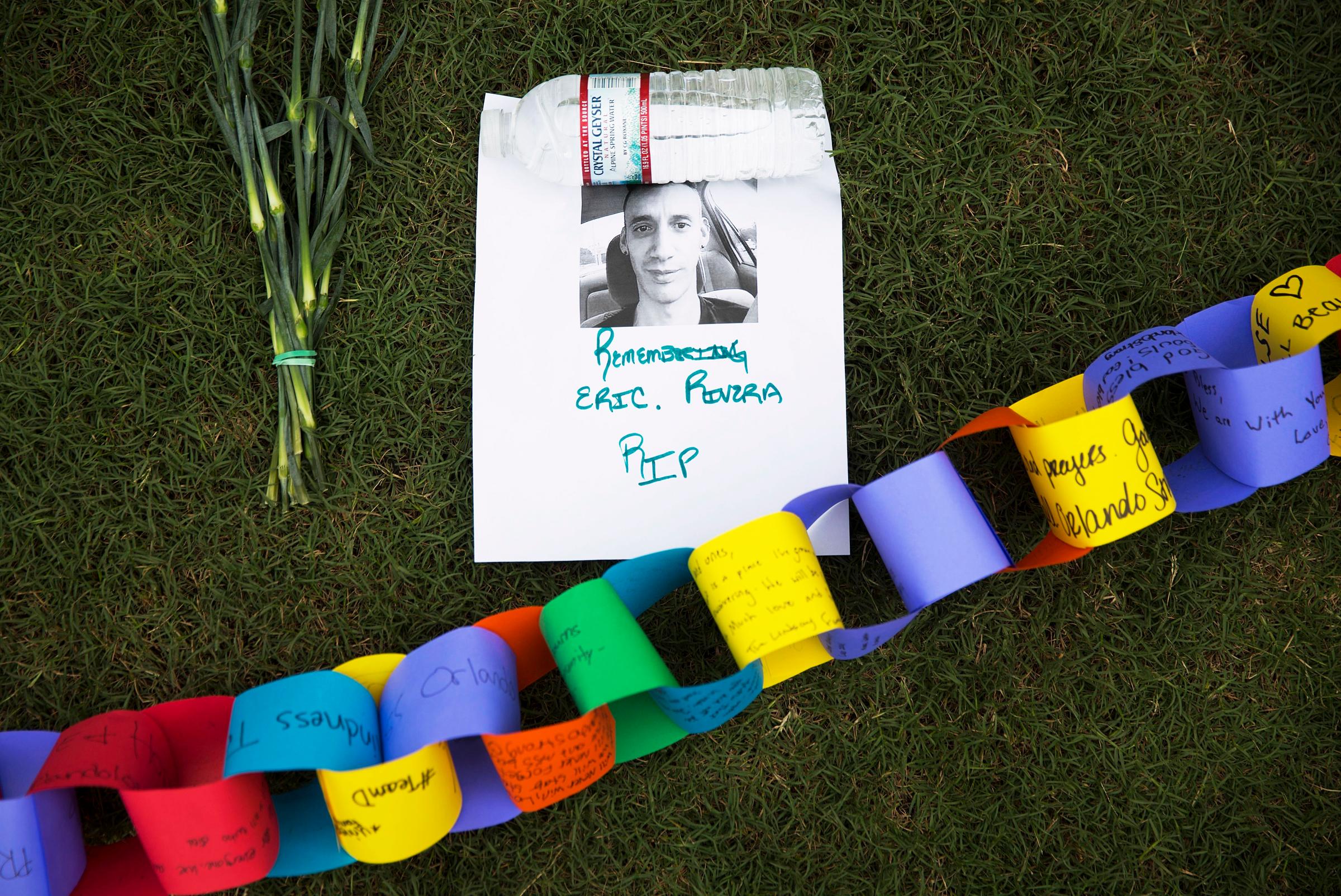 A remembrance for Eric Rivera, killed in the mass shooting at the Pulse nightclub, sits amongst a makeshift memorial for the victims in Orlando, Fla., on June 13, 2016.