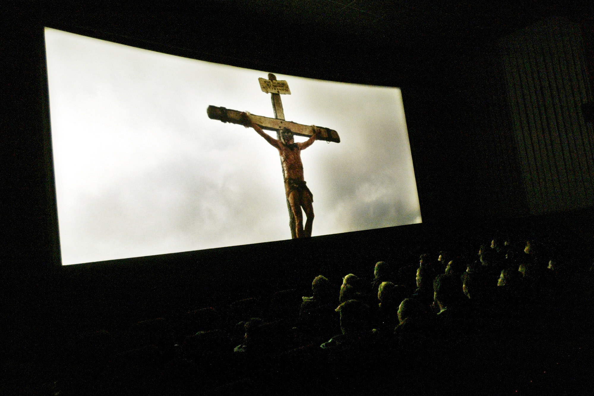 People view Mel Gibson's film "The Passion of the Christ" at Cinema Carousel in Norton Shores, Mich., in 2004. (Cory Morse—The Muskegon Chronicle/AP)