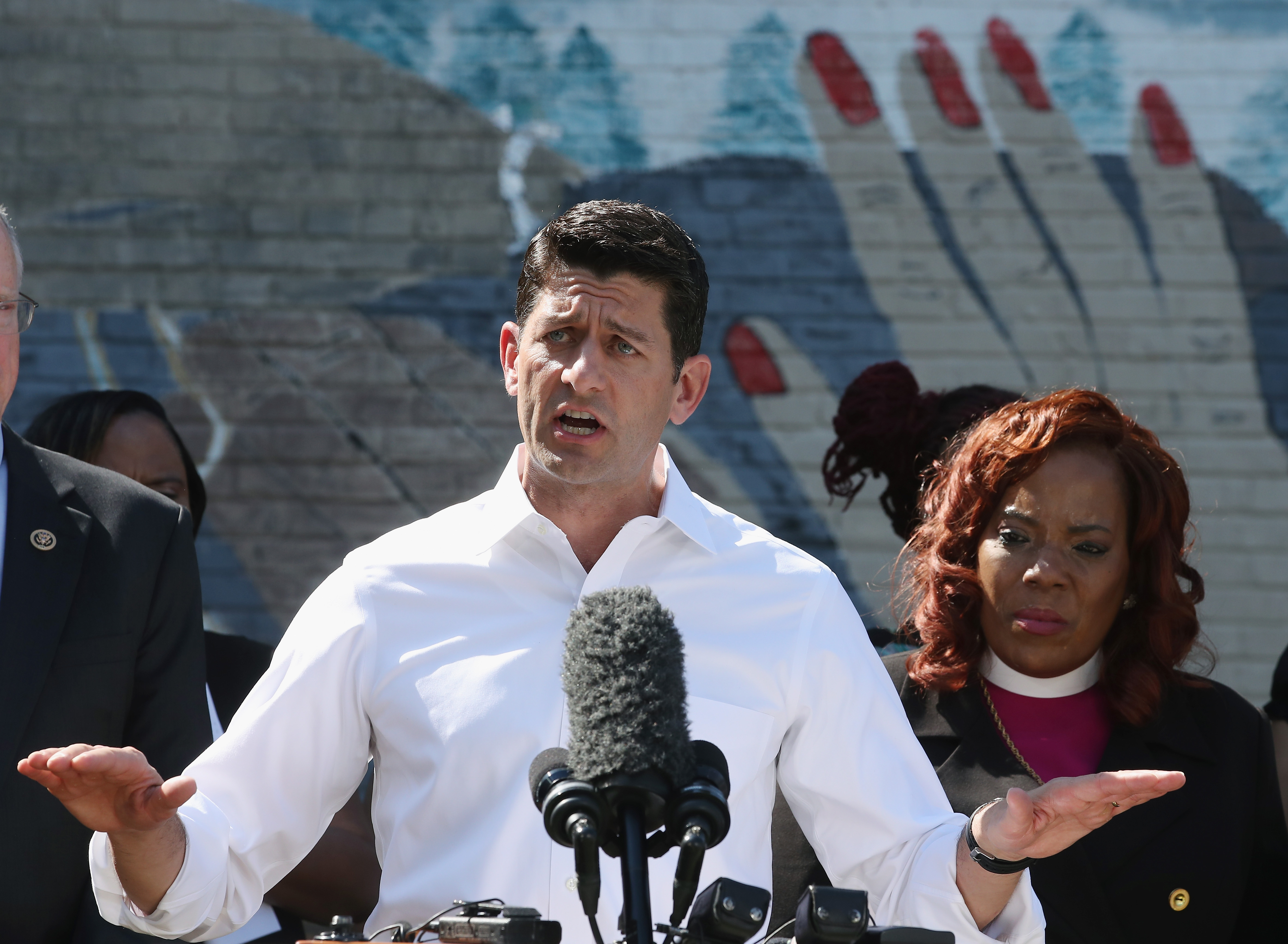 U.S. Speaker of the House Paul Ryan (R-WI), speaks while flanked by Bishop Shirley Holloway at the Graceview Apartments, June 7, 2016 in Washington, DC. (Mark Wilson/Getty Images)