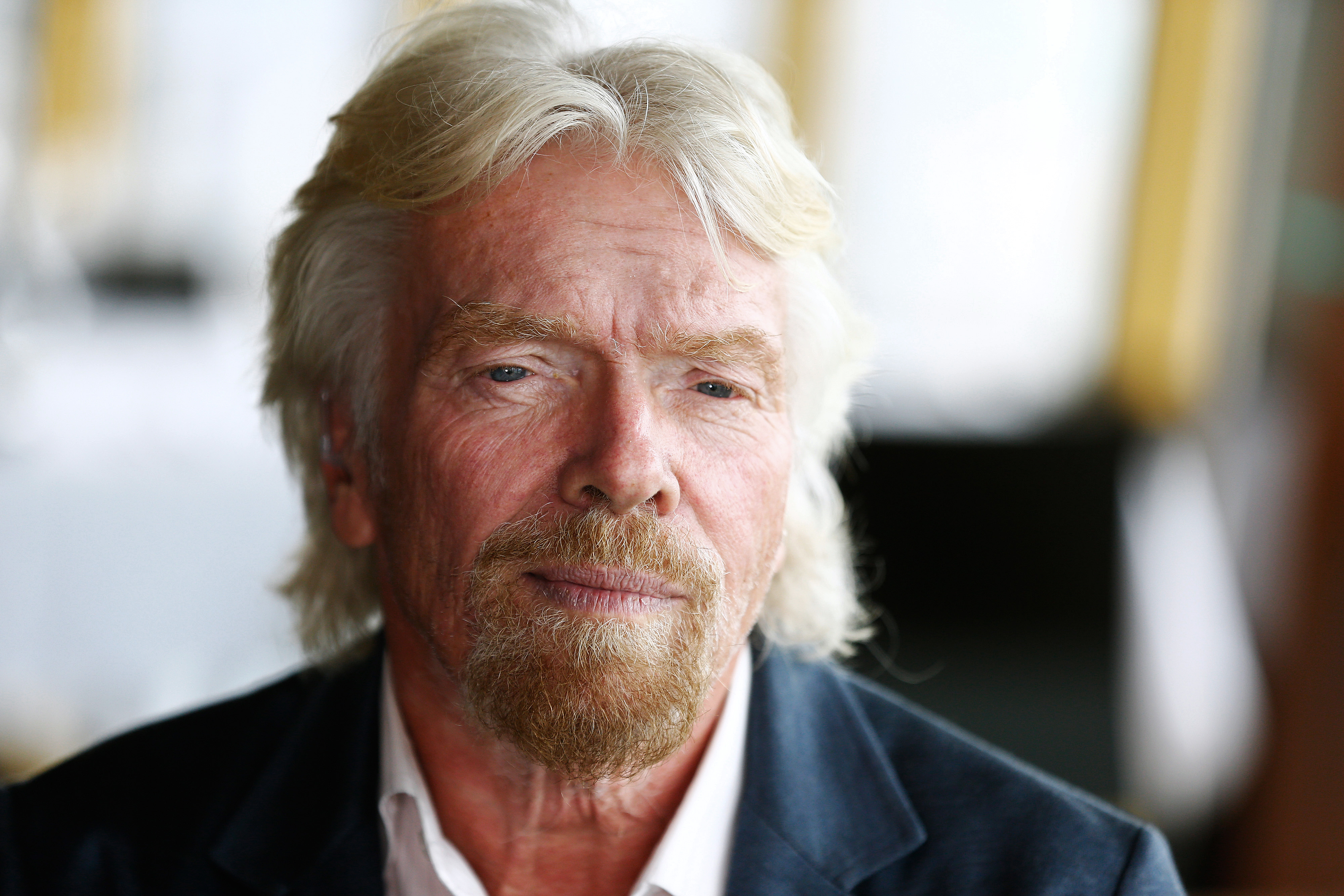 Billionaire Richard Branson, founder of Virgin Group, listens during a Bloomberg Television interview in Sydney, Australia, on May 26, 2016. (Brendon Thorne—Bloomberg/Getty Images)