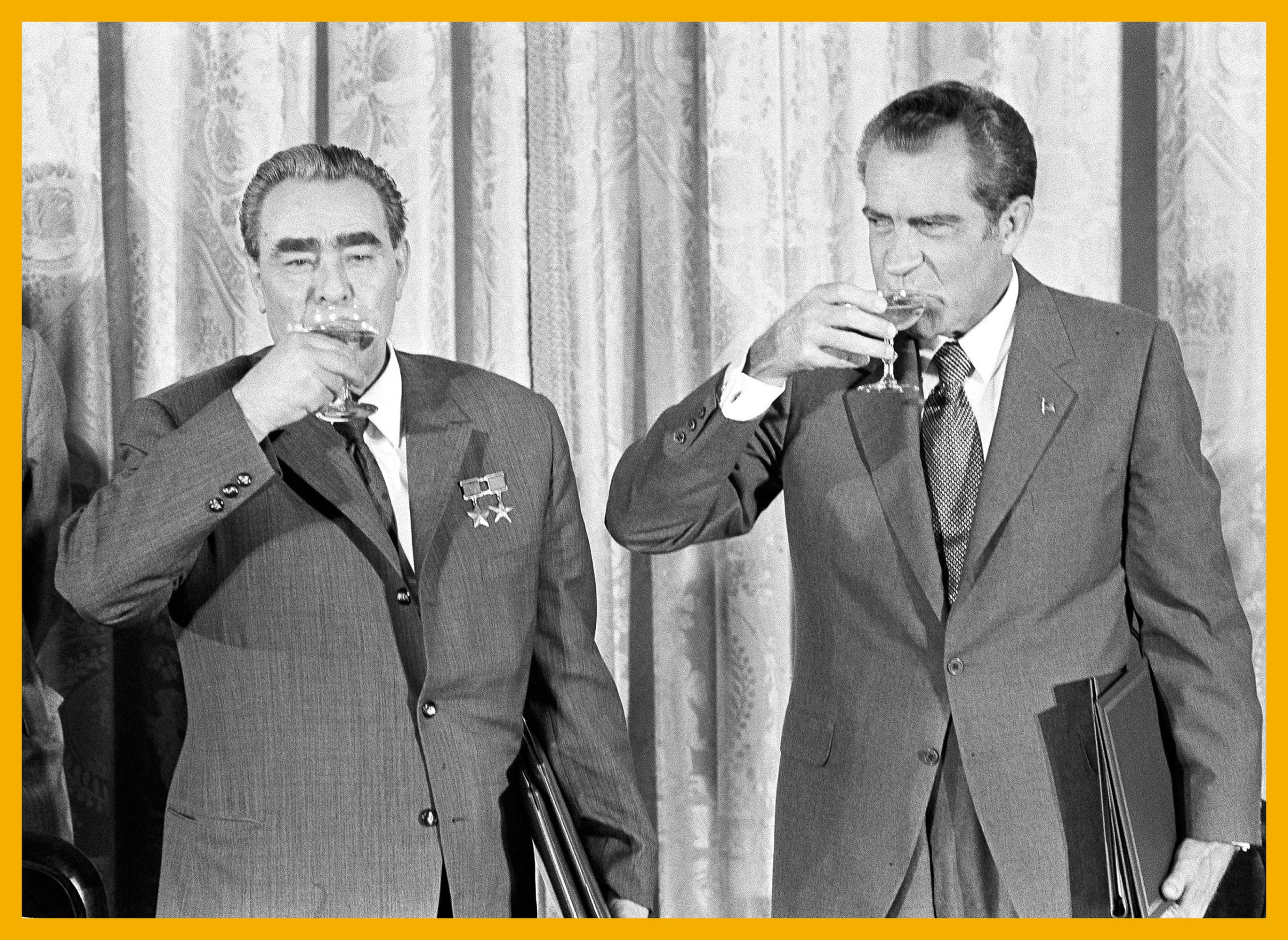 Richard Nixon drinking champagne with Soviet Leader Leonid Brezhnev on June 21, 1973