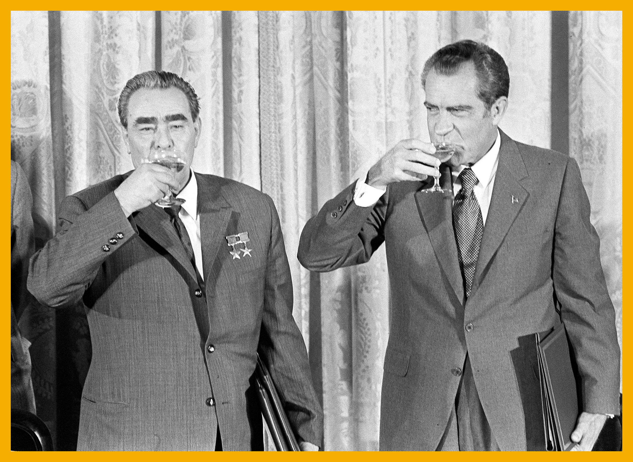 President Richard M. Nixon, right, and Soviet leader Leonid Brezhnev drink a toast at the White House in Washington, June 21, 1973. The toast comes after the two leaders signed a pact to limit offensive nuclear arsenals. (AP Photo)
