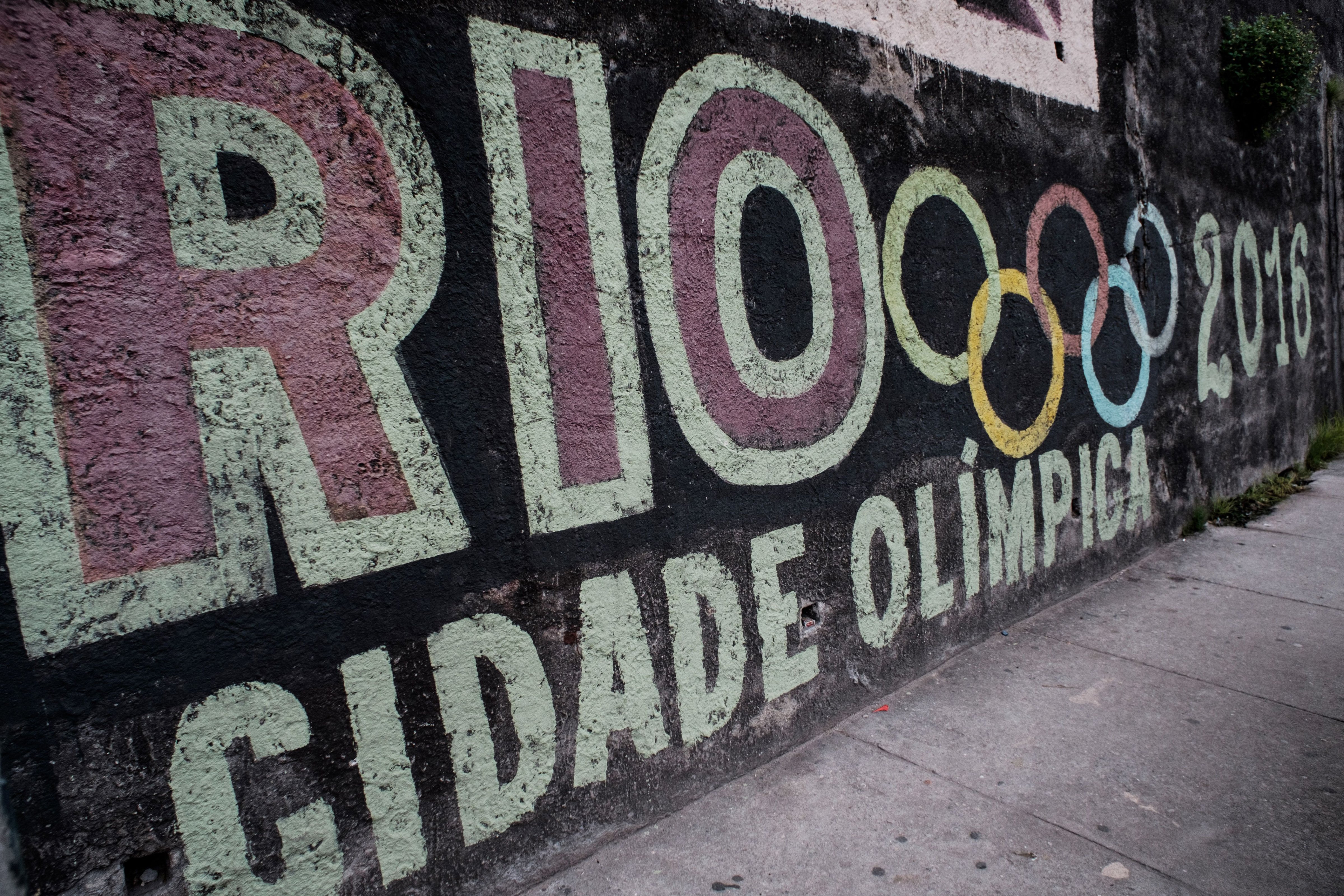 A graffiti with the logo of the Olympic Games on a wall of Rio de Janeiro, Brazil, on June 4, 2016. (Yasuyoshi Chiba—AFP/Getty Images)