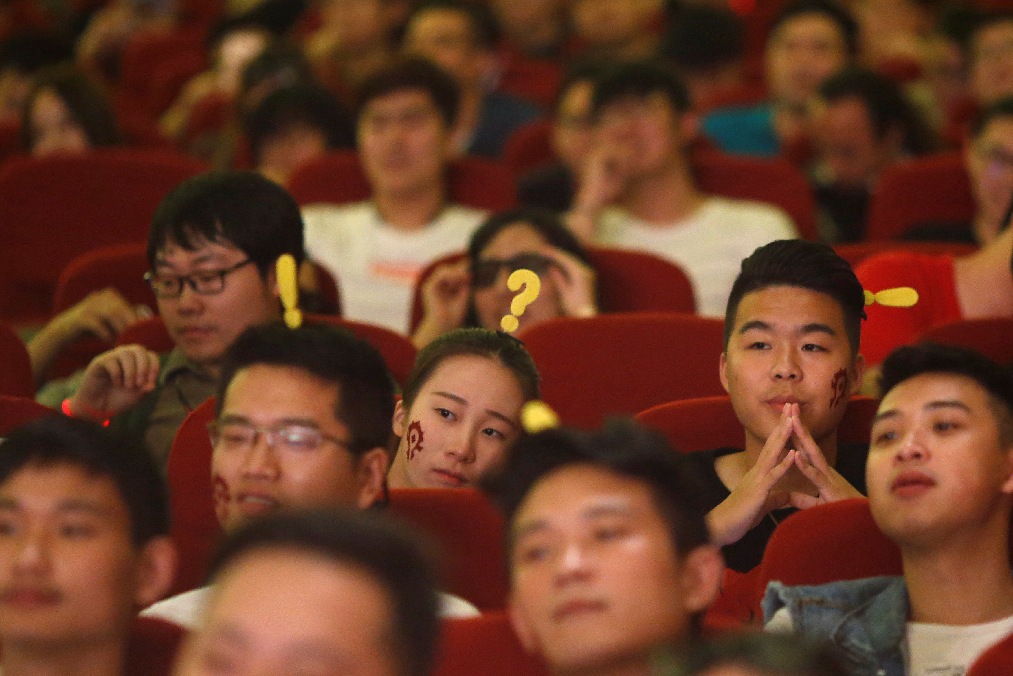 Fans attend China's premiere of the film "Warcraft" at a theatre in Shanghai