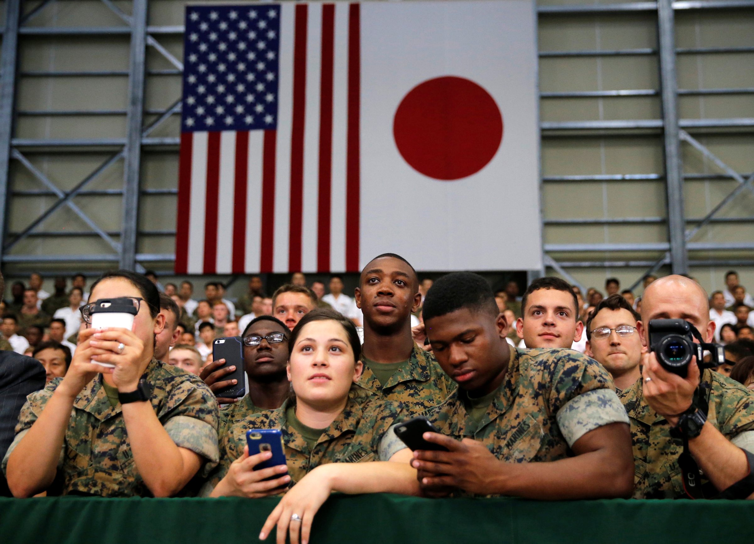 U.S. and Japan Self-Defence Force's soldiers listen a speech by U.S. President Barack Obama  during his visits at Iwakuni Marine Corps Air Station, enroute to Hiroshima, Japan