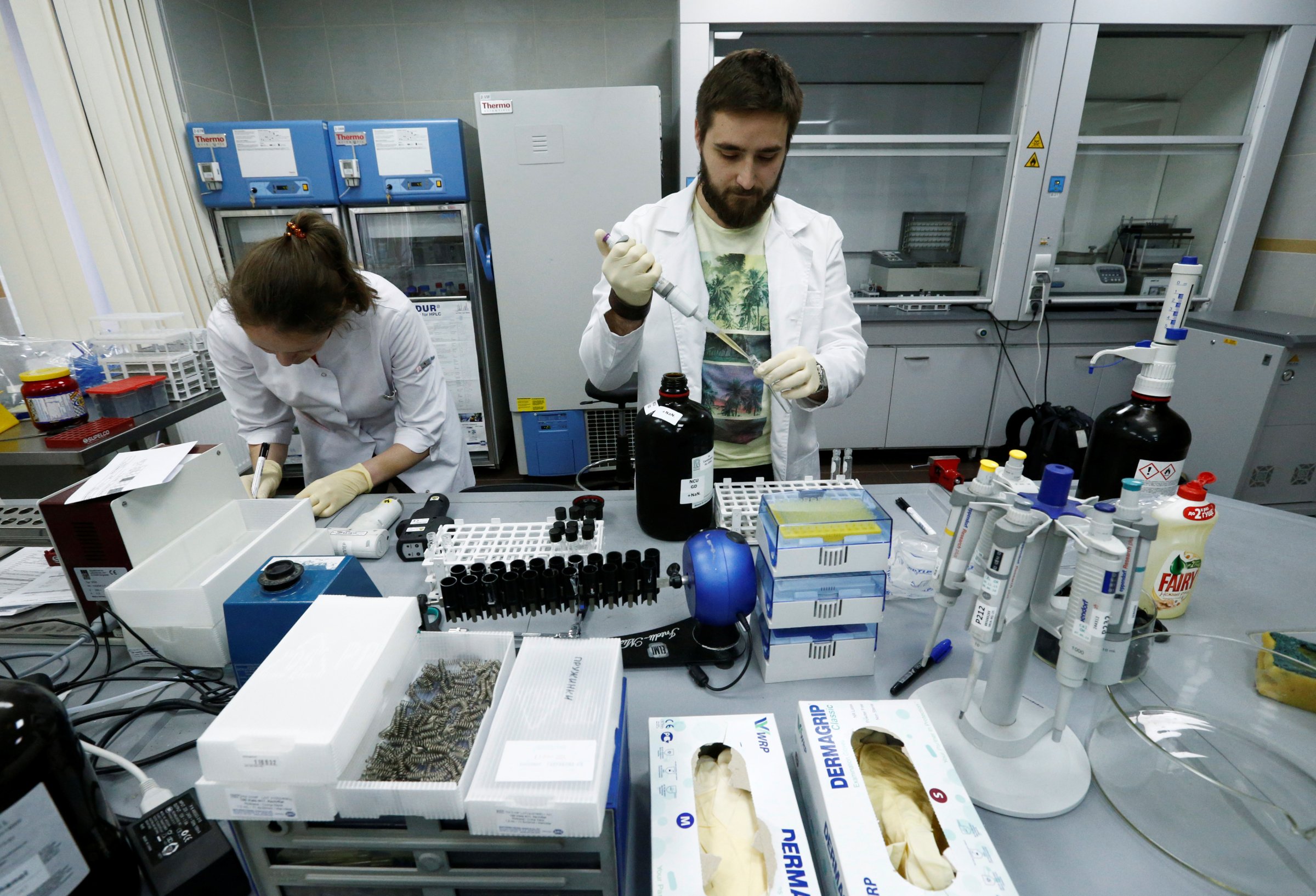 Technicians work at the Russian anti-doping laboratory in Moscow, May 24, 2016.