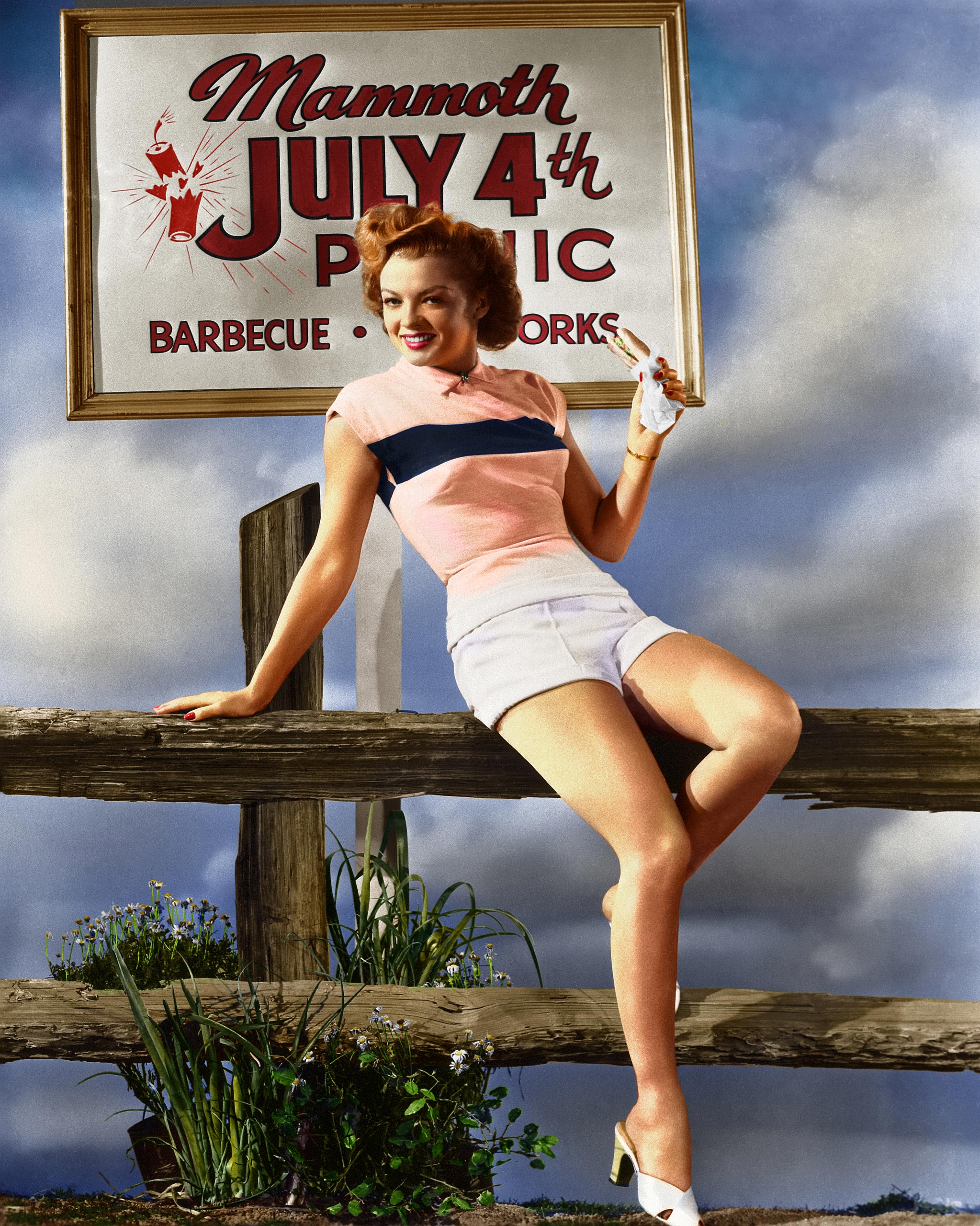 No Fourth of July is complete without a picnic, and no picnic is complete without pretty girls. RKO Radio starlet Myrna Dell typifies the American girl at a traditional independence celebration. Hollywood, California, 1948.