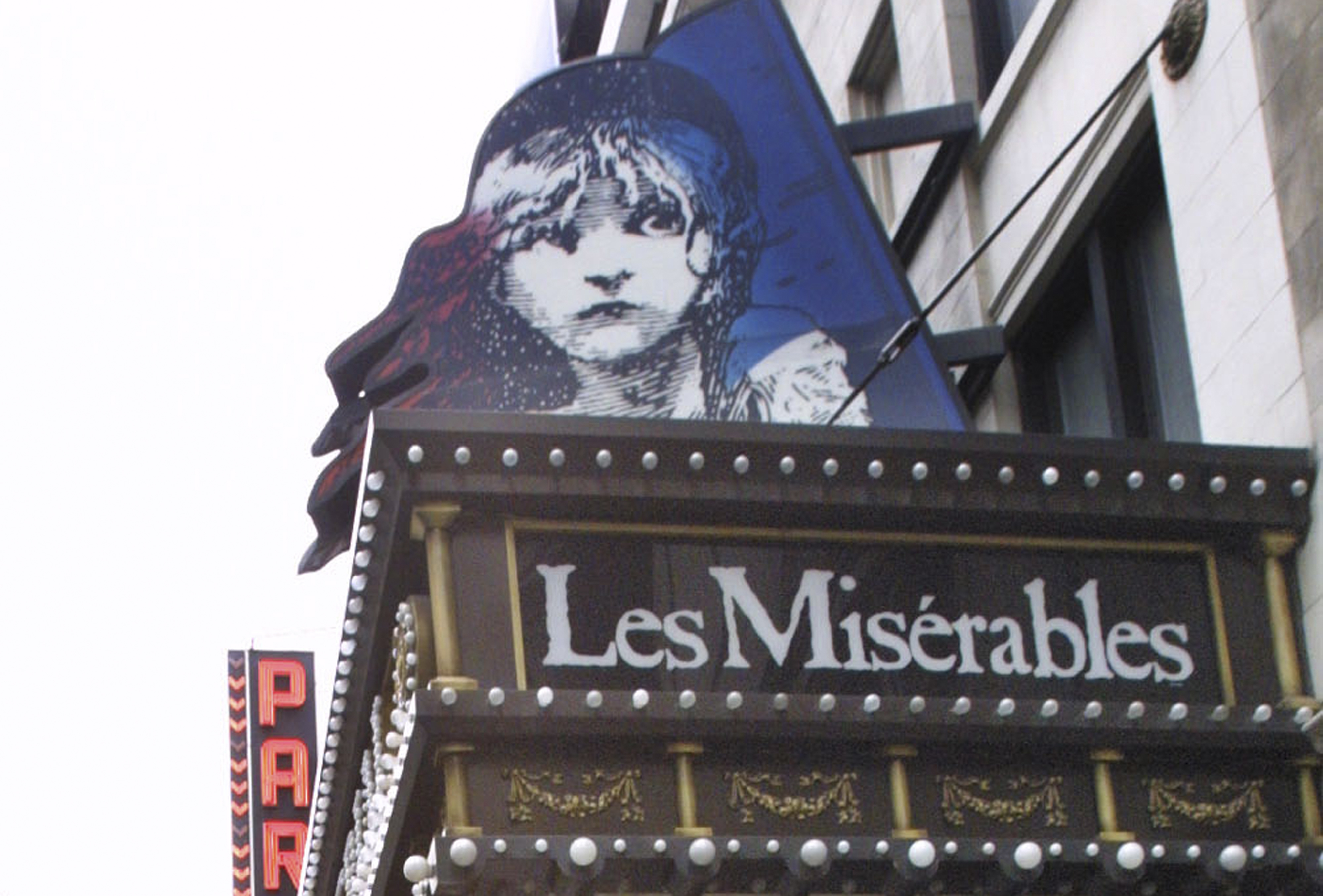 Amarquee displays the advertisement for theater show Les Miserables, in New York on March 11, 2003. (Tina Fineberg—AP)