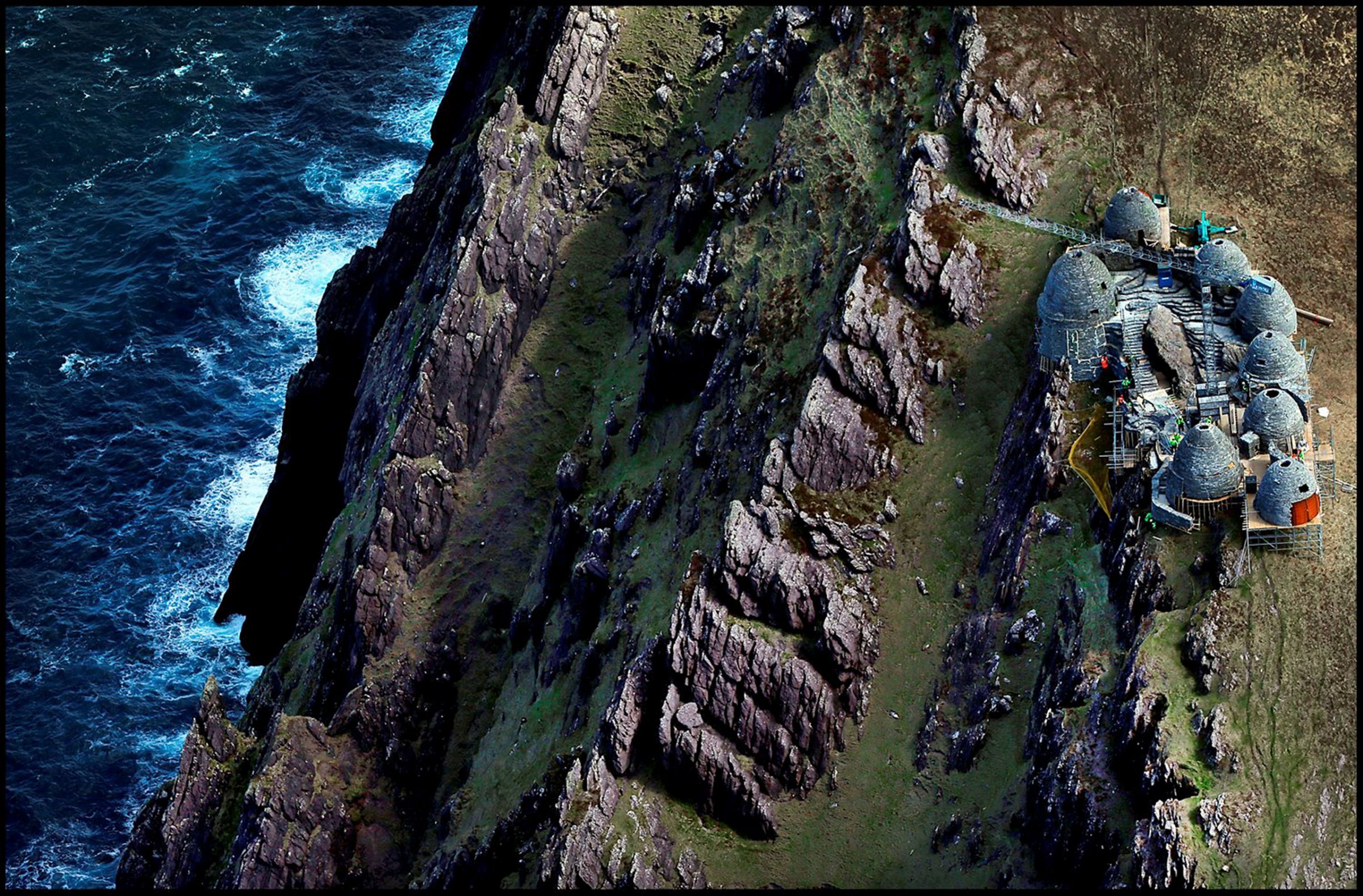 A replica of the sixth-century monastic settlement has been recreated on top of Ceann Sibéal on the Dingle Peninsula in Ireland's Co Kerry, ahead of "Star Wars" filming, April 30, 2016. The site, which includes eight beehive huts, is supposed to be the planet Ahch-To, home to the first Jedi temple where Luke Skywalker has been in exile, and is just one of several locations being used along the western Ireland seaboard.
