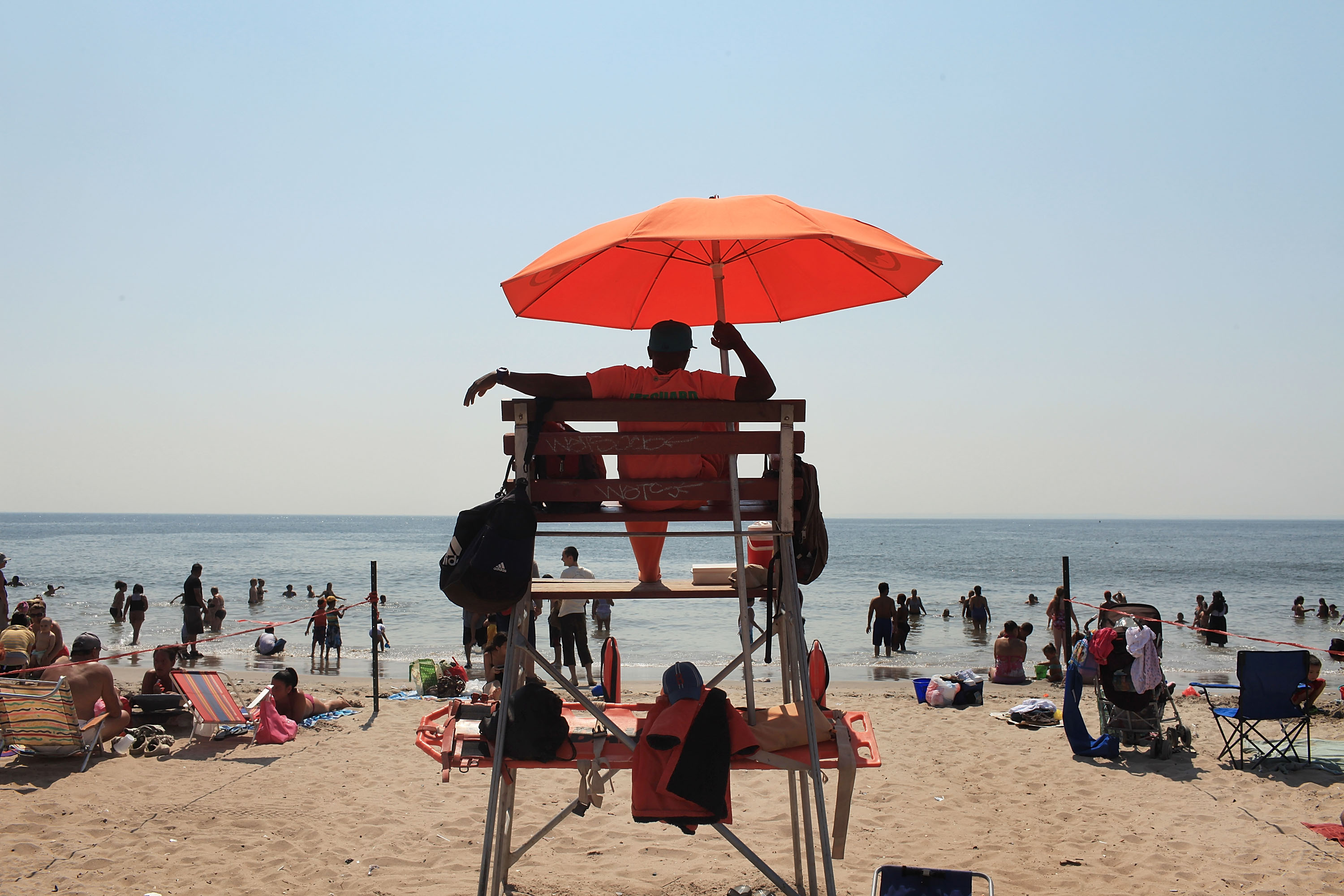 A life guard watches swimmers on a hot afternoon at Coney Island on Aug. 31, 2010 in New York City. (Spencer Platt—Getty Images)