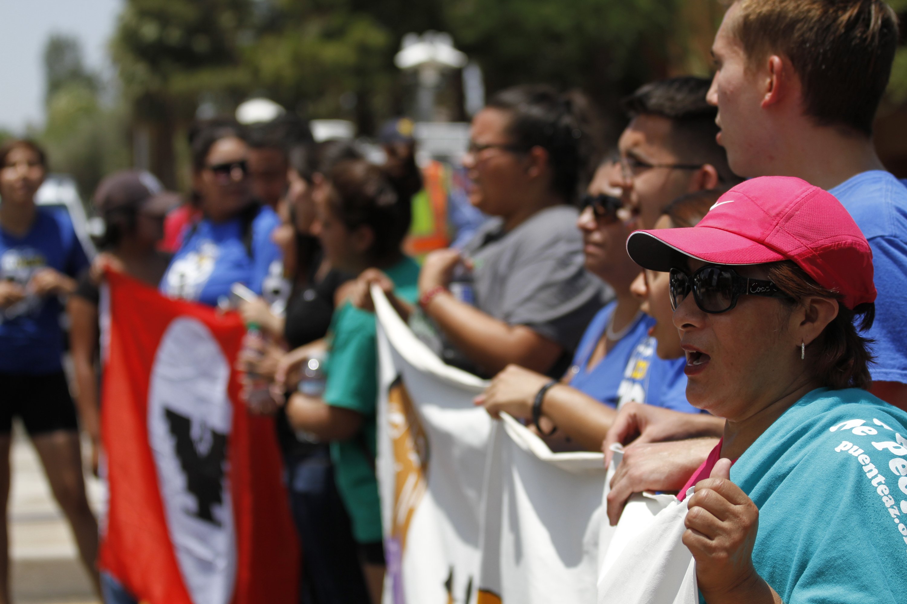 Activists protest a Supreme Court decision on immigration in Phoenix, on June 23, 2016. (Beatriz Costa-Lima&mdash;AP)