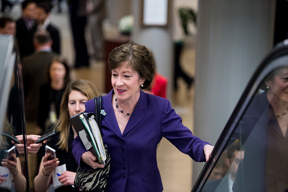 Sen. Susan Collins, R-Maine, speaks with reporters as she arrives in the Capitol for a vote on Wednesday, March 25, 2015.
