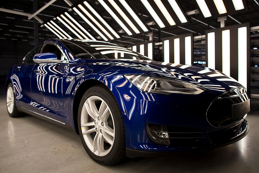 A Tesla Model S automobile stands in a light tunnel during quality control checks ahead of European shipping from the Tesla Motors Inc. factory in Tilburg, Netherlands, on Oct. 8, 2015. (Bloomberg&mdash;Bloomberg via Getty Images)
