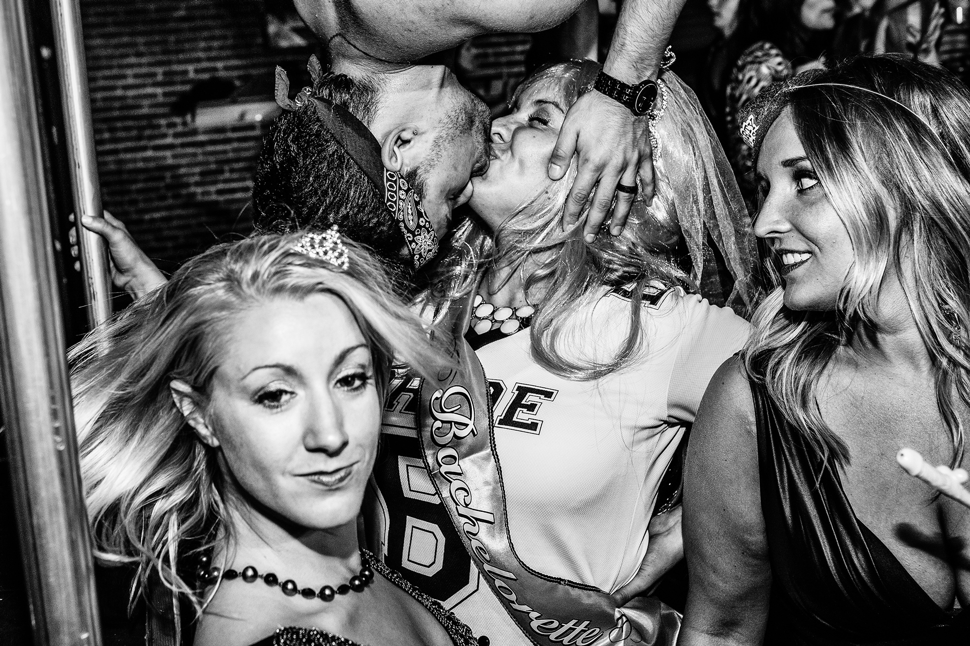 A bachelorette party is entertained by a go-go boy at R Place on June 12th, 2014, in Seattle.