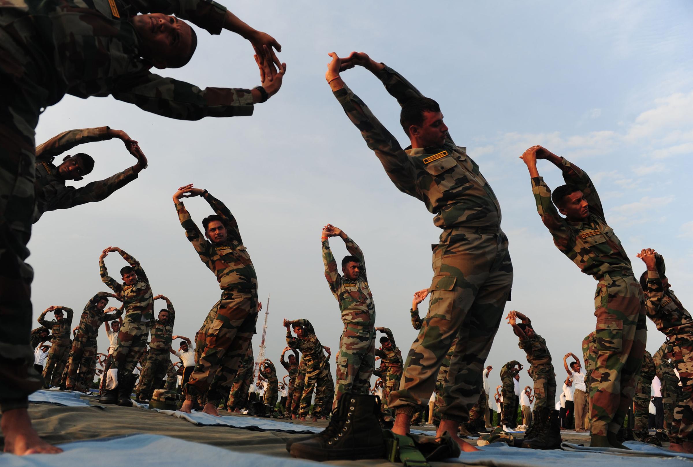 Indian Army soldiers participate in a yoga demonstration on International Yoga Day in Chennai, India, on June 21, 2016.