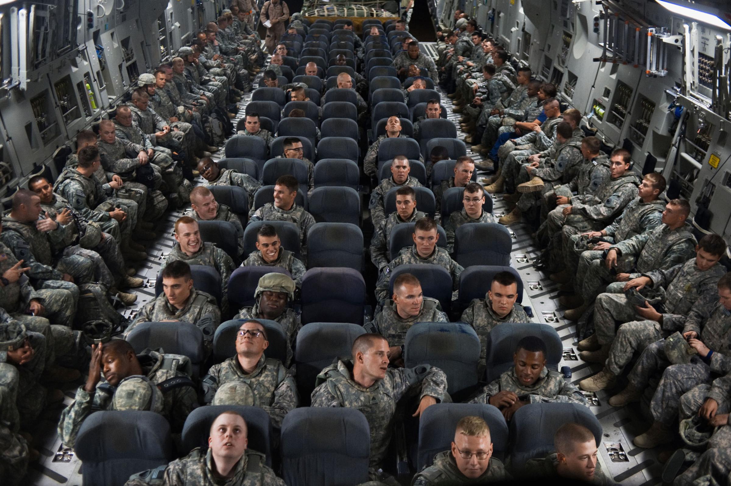 Soldiers from the Virginia National GuardÕs 1st Battalion, 116th Infantry Regiment, head back to the U.S. from Camp Adder, having served eight months, marking the end of the U.S. combat mission in Iraq ends after seven years, Aug. 5, 2010.