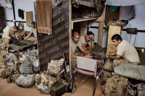 Members of the U.S. Army relax inside a makeshift barracks at Camp Swift, a U.S. forward base near the Iraqi town of Makhmour, Iraq, May 17, 2016. As of April, at least 4,087 U.S. military personnel were deployed in Iraq, many of them backing Iraqi forces in the drive to reclaim territory from ISIS.