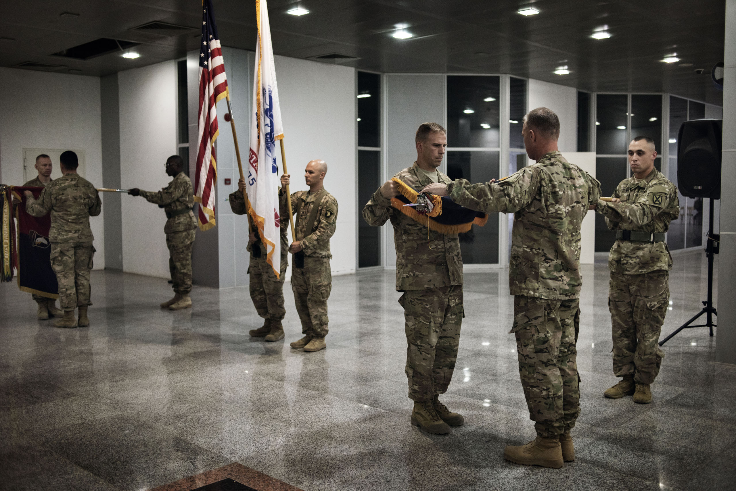 U.S. Officers and soldiers from the U.S. military, Iraqi armed forces, and Kurdish forces, participate in a U.S. transfer of authority ceremony in Erbil, in  northern Iraq's semi-autonomous Kurdish region, May 17, 2016.