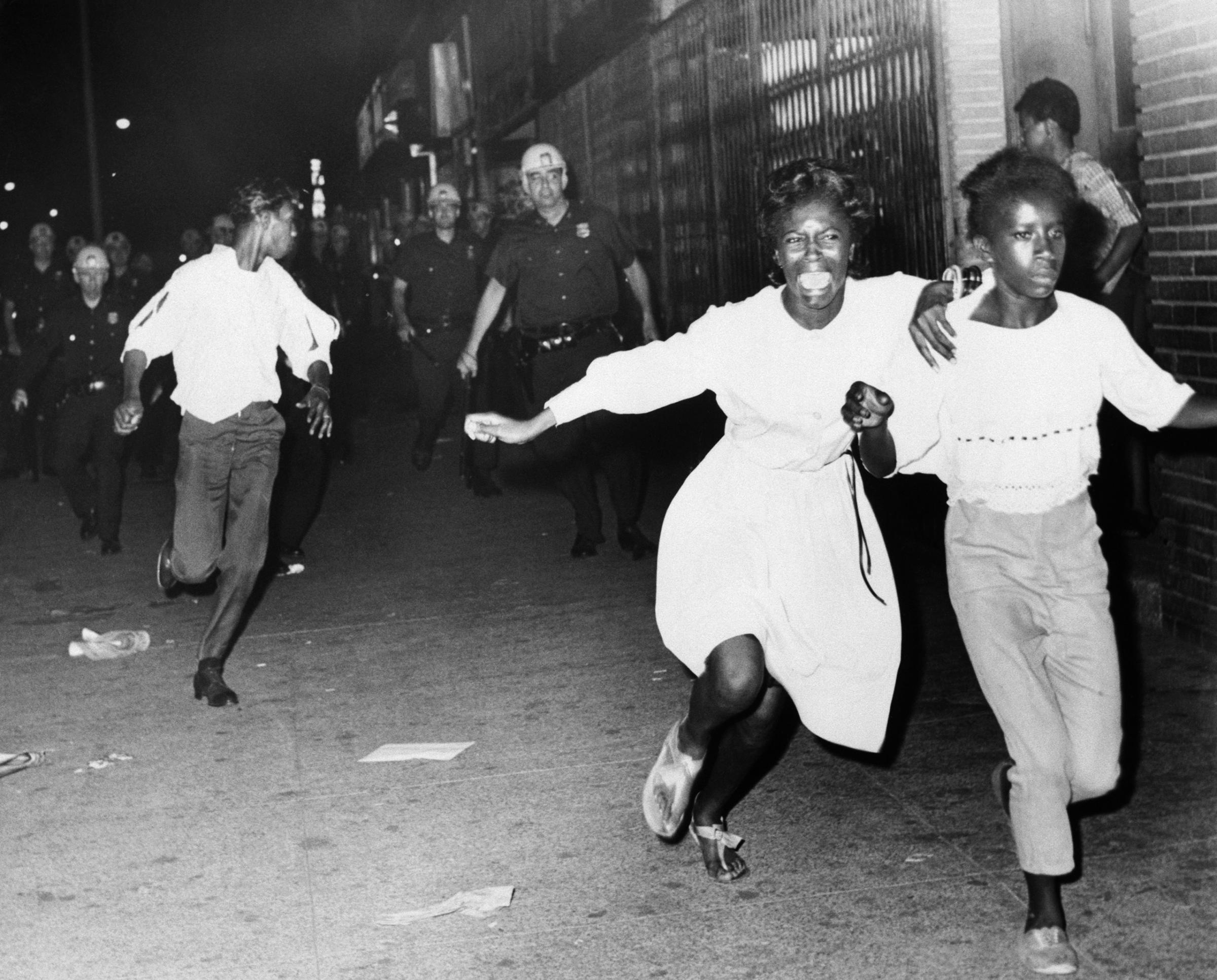 Girls Fleeing from Police During Riot in Brooklyn, 1964.