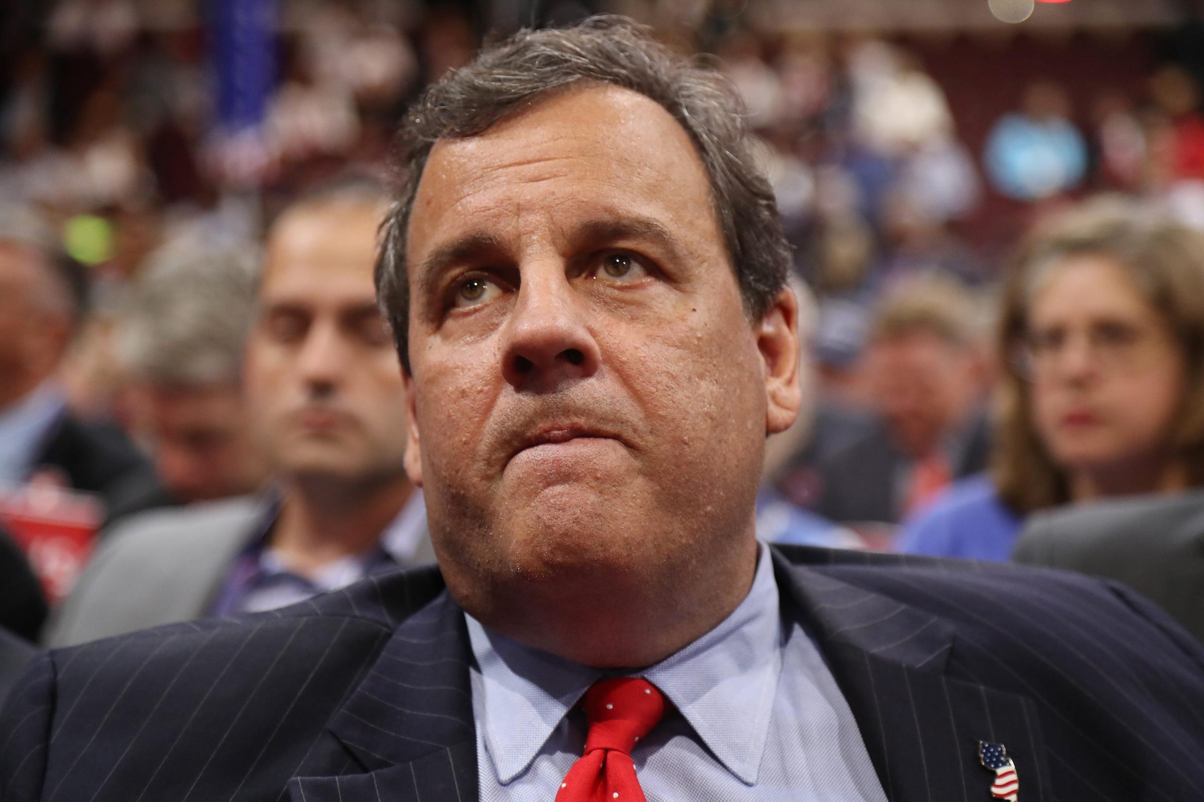 New Jersey Governor Chris Christie listens during the second session on the first day of the 2016 Republican National Convention at Quicken Loans Arena in Cleveland, July 18, 2016.