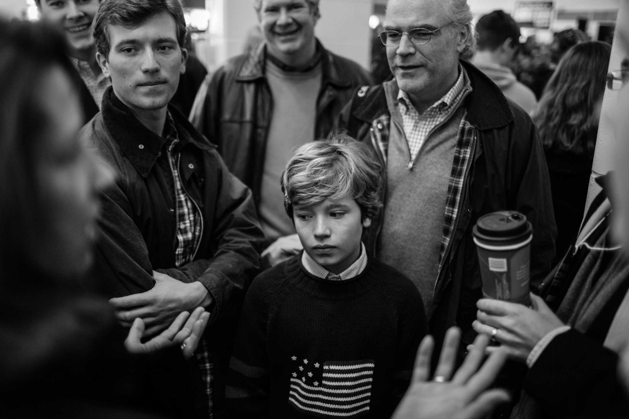 07-Feb-2016---Londonderry,-New-Hampshire---A-boy-stands-encircled-by-family-at-a-Marco-Rubio-Pancake-event-Cedric-Von-Niederhausern-politics-convention-hillary-clinton-donald-trump-documentary-photo-journalism-black-andwhite