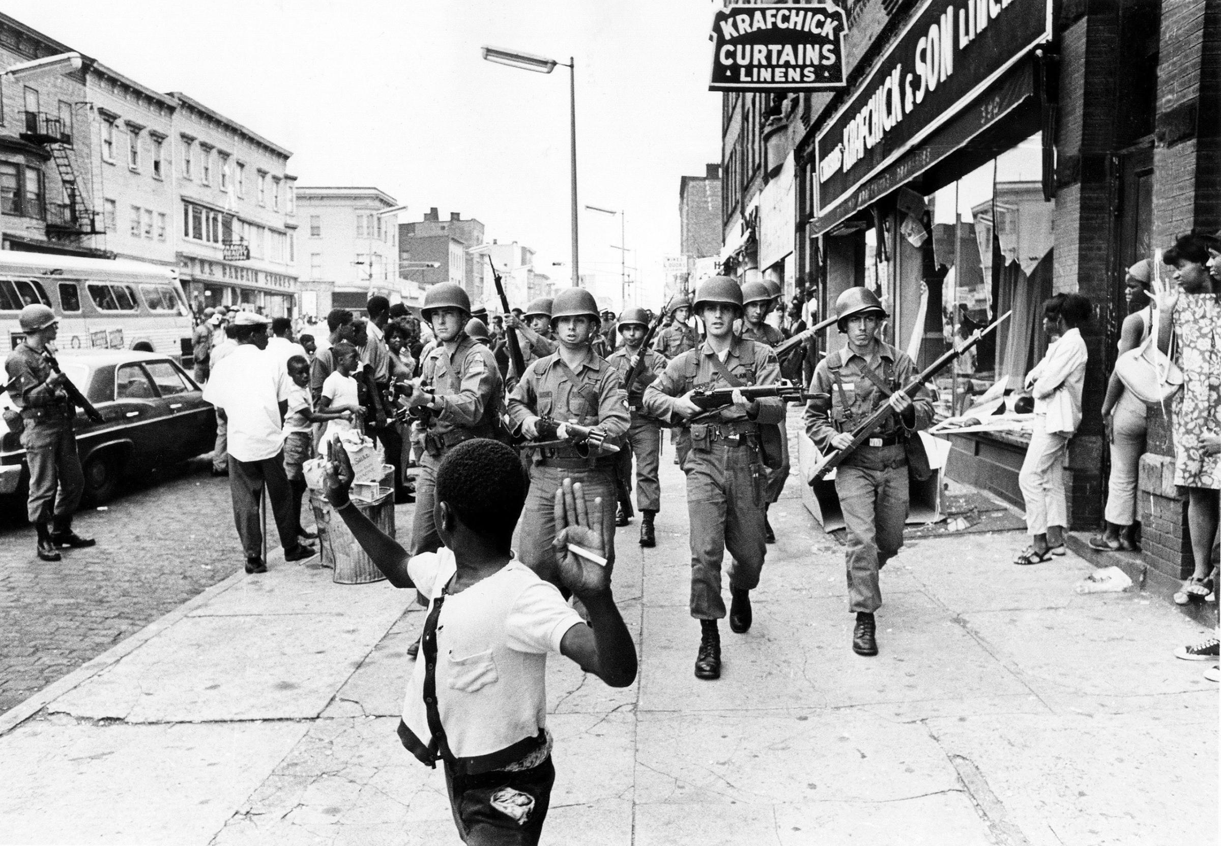National Guard on Springfield Avenue in Newark, N.J. clearing the street on July 14, 1967, after rioting took place.