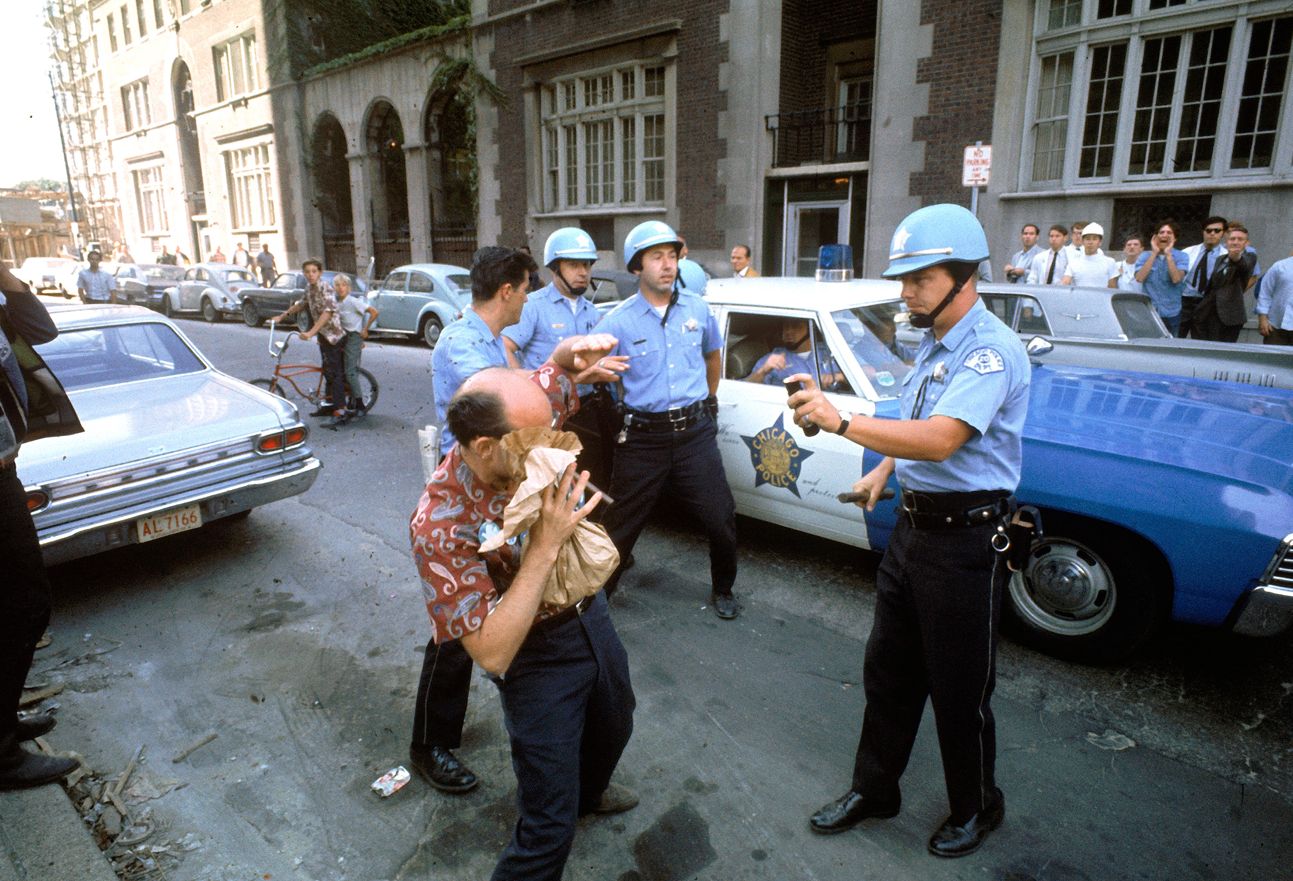 Police macing a protester during the 1968 Democratic National Convention.