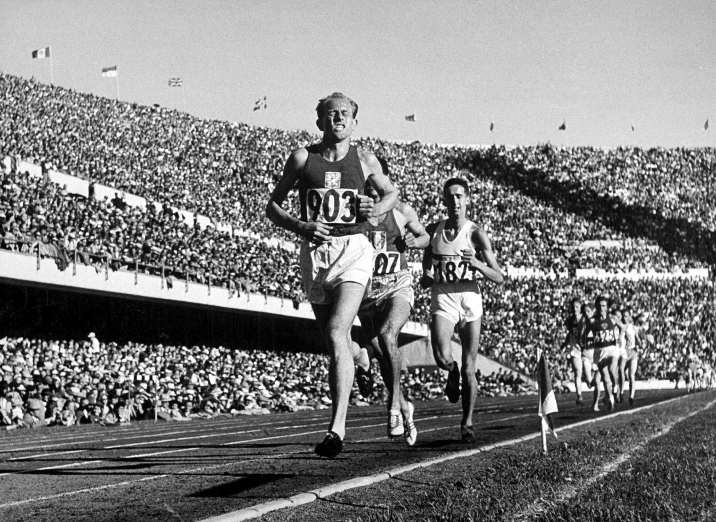 Czech track and field gold medalist Emil Zatopek leading pack during the 1952 Olympic games in Helsinki, Finland.