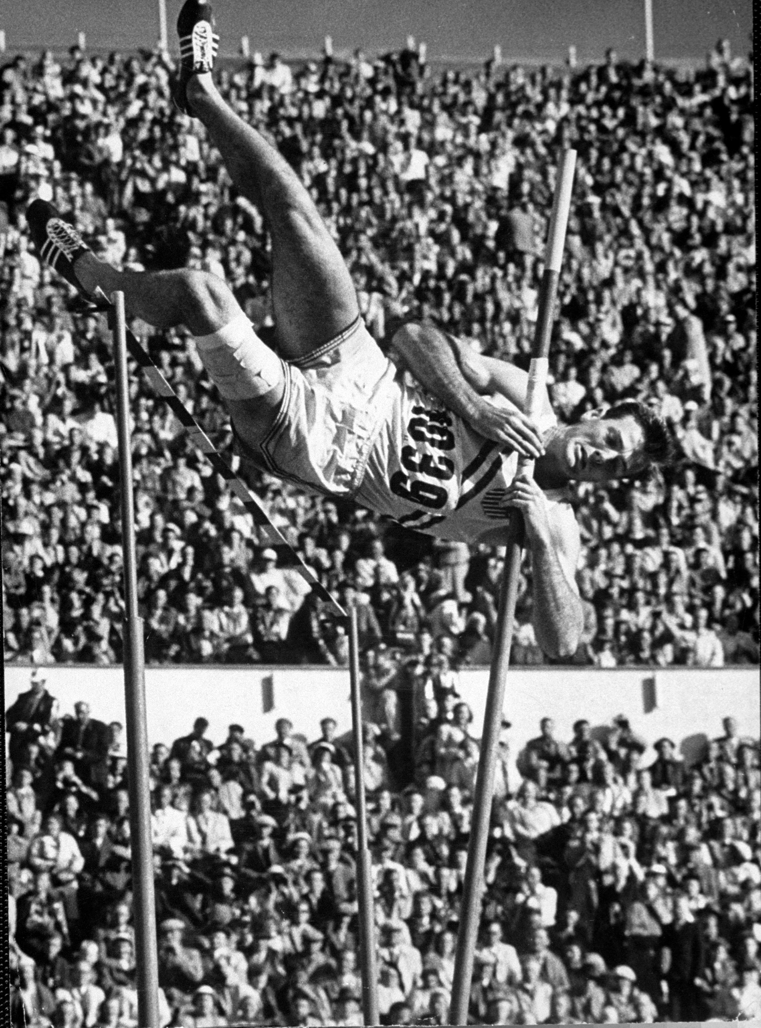 Robert B. Mathias attempting the pole vault at 1952 summer Olympics in Helsinki, Finland.