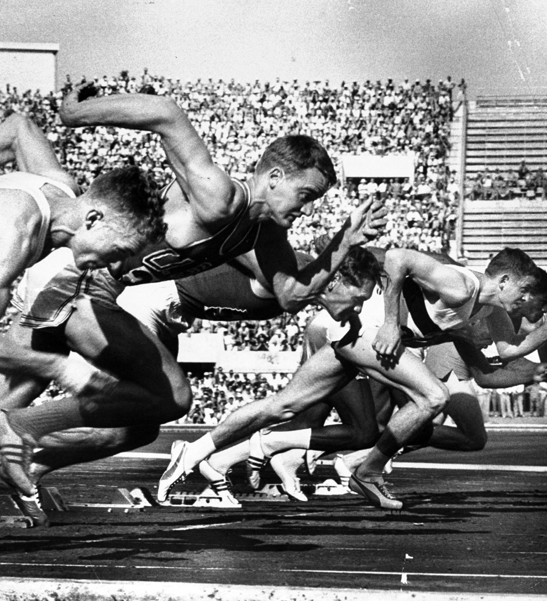 German Armin Harry (C) during men's 100-meter dash event at the 1960 summer Olympics in Rome, Italy.