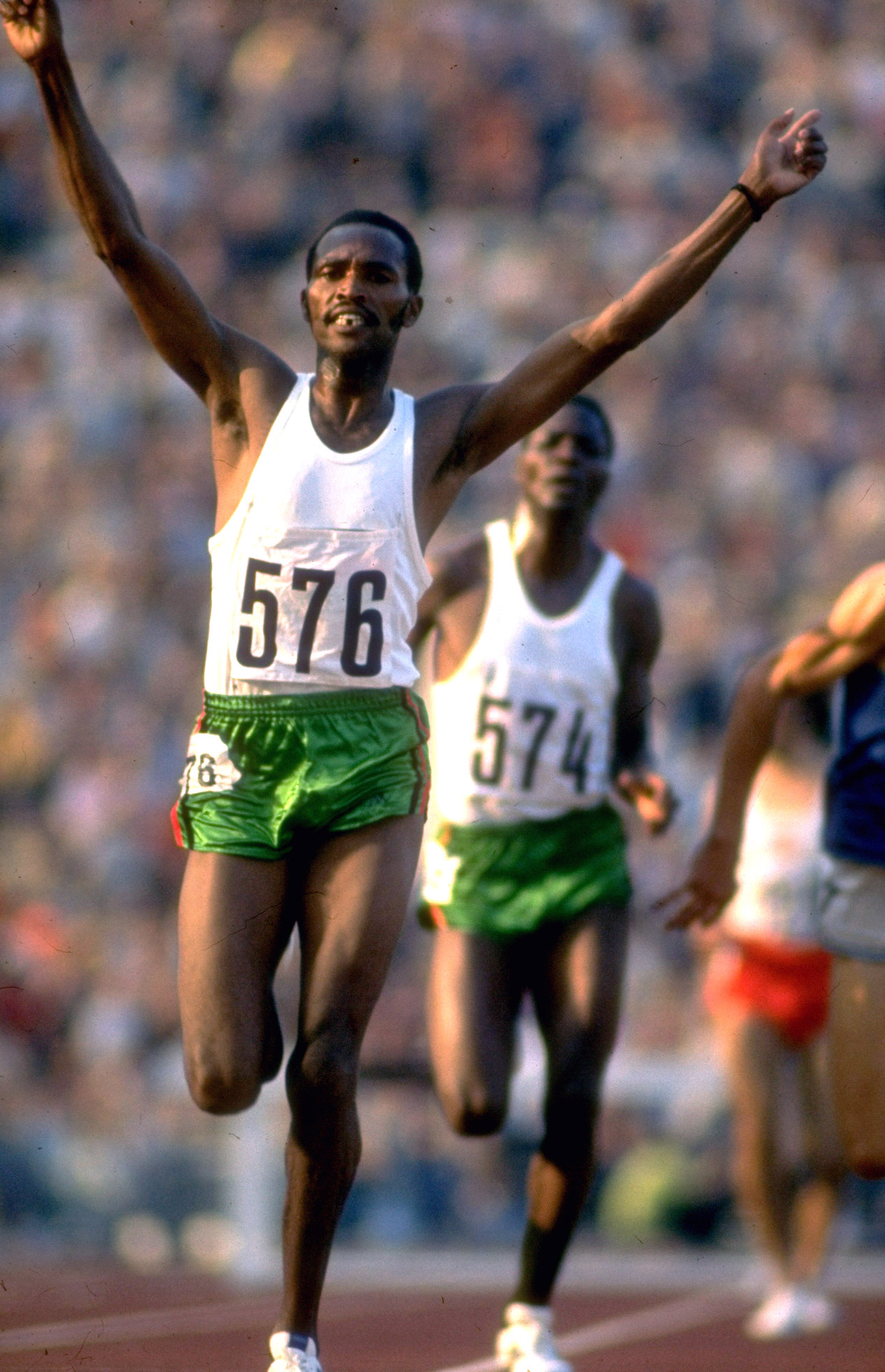 Kenyan track star Kipchoge Keino finishing ahead of teammate Ben Jipcho (574) in the 3,000-meter steeplechase final at the 1972 summer Olympics in Munich, West Germany.