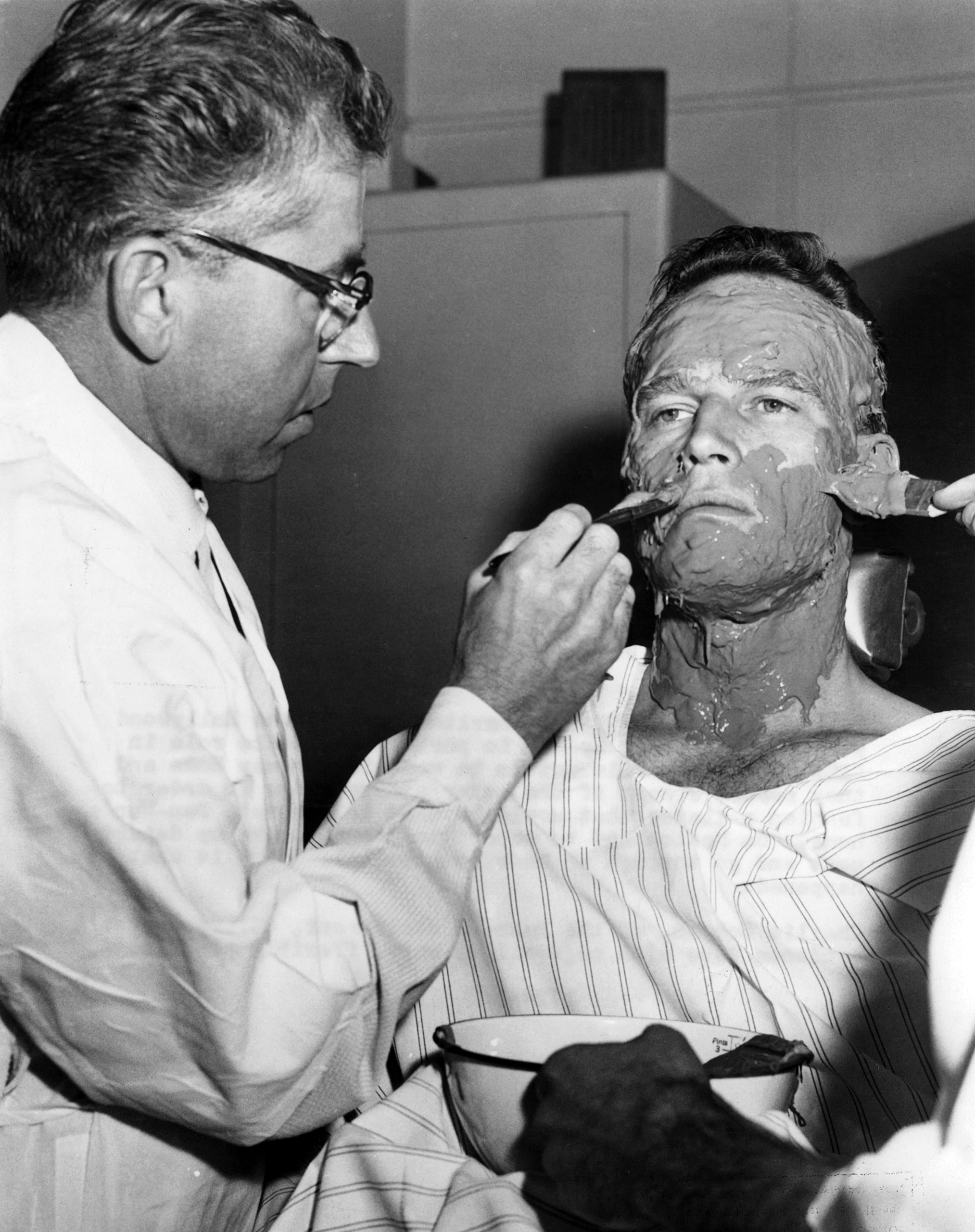 Charlton Heston begins to get his face cast in publicity portrait from the film Ben-Hur 1959.