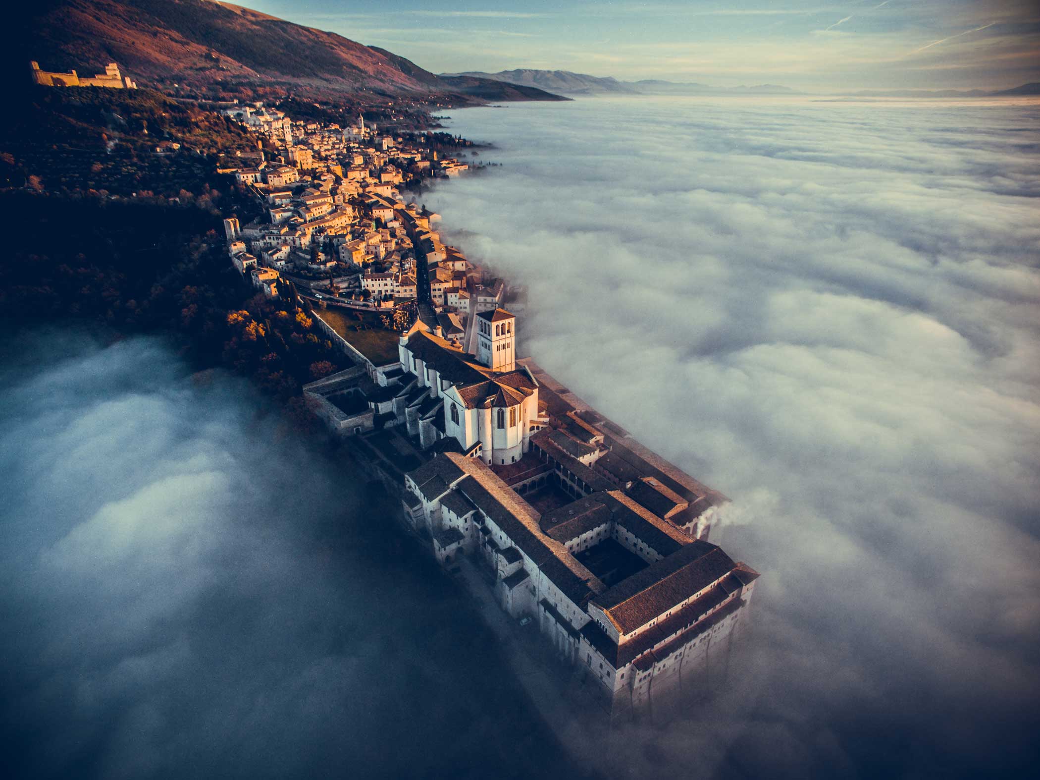 "...after the
                      drone came out from the clouds the view was spectacular and got me completely astonished
                      and, without breathing, I had the time to take some shots before the sun went down and
                      the cloud got higher hiding everything." (Francesco Cattuto. Courtesy of <a href="http://www.dronestagr.am/" target="_blank">Dronestagram</a>)