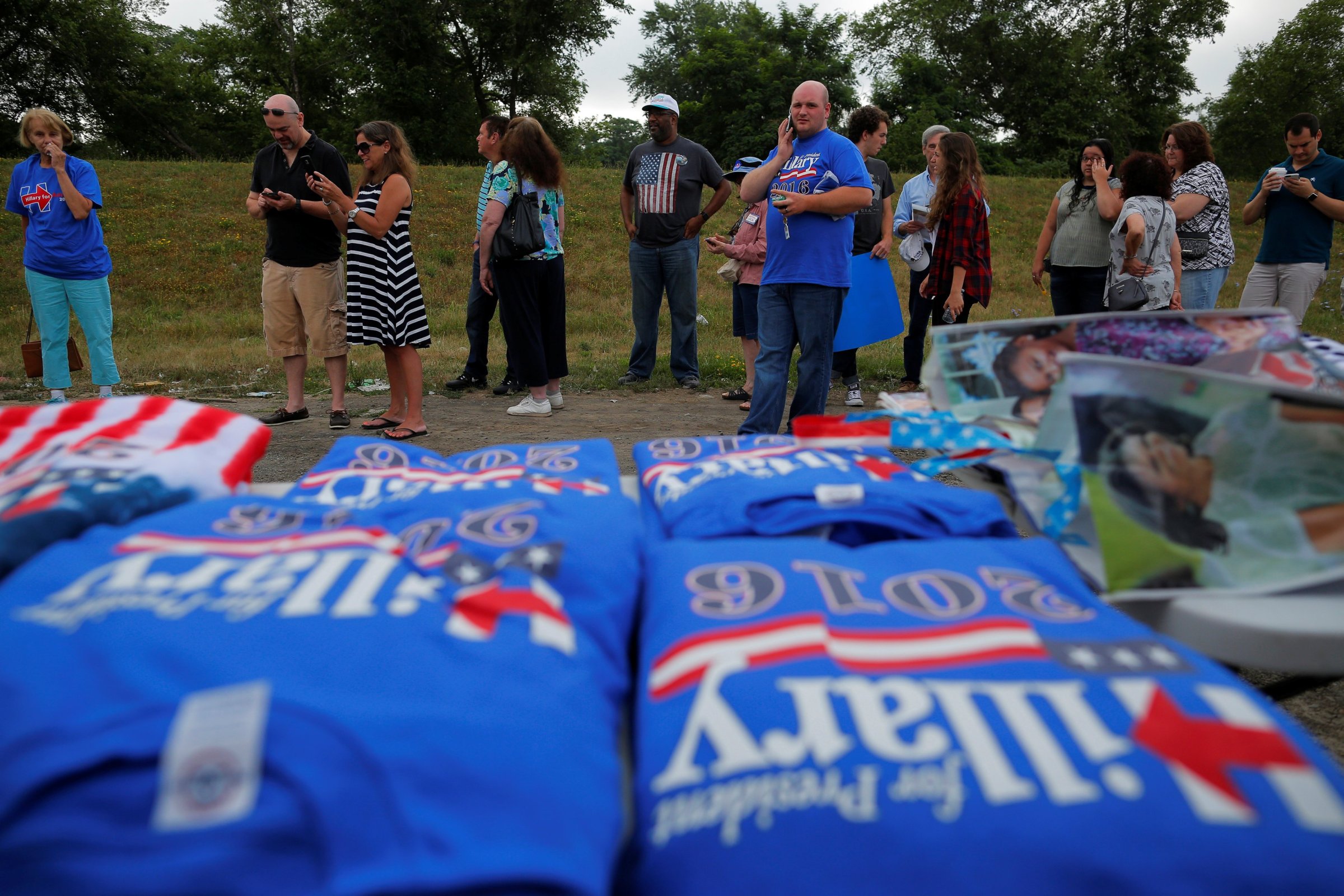 Guests wait in line before a campaign event with U.S. Democratic presidential candidate Hillary Clinton and U.S. Vice President Joe Biden in Scranton, Penns. on July 8, 2016, which was postponed "due to the tragic events in Dallas," according to the campaign.