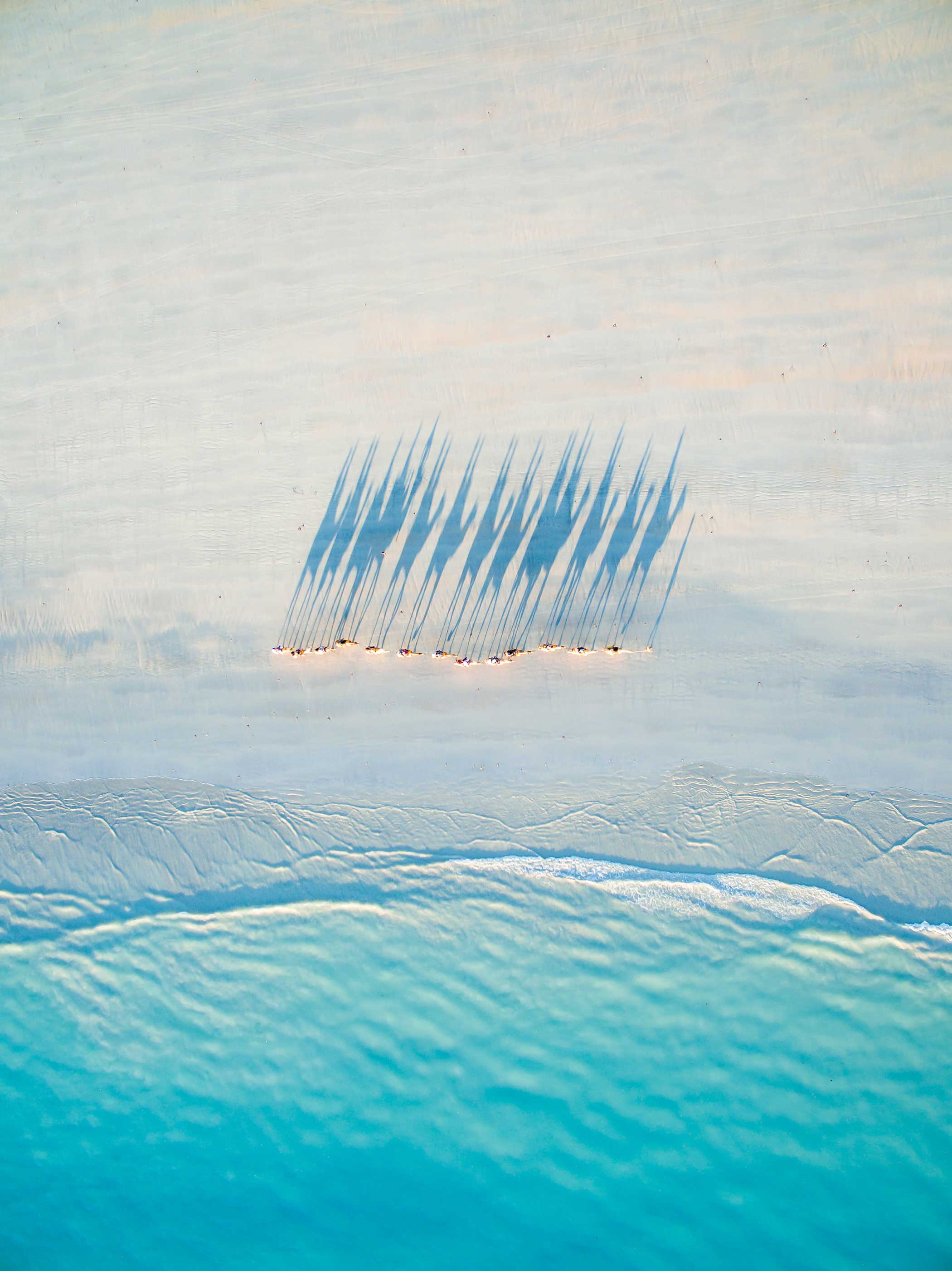 2nd Place—Travel  This image was captured while honeymooning at Cable Beach, Western Australia. We rented a 4WD
                              and drove 8,000 klms around outback Australia. I like the 100% vertical downward point of view that is so well captured by camera equipped quadcopters.
