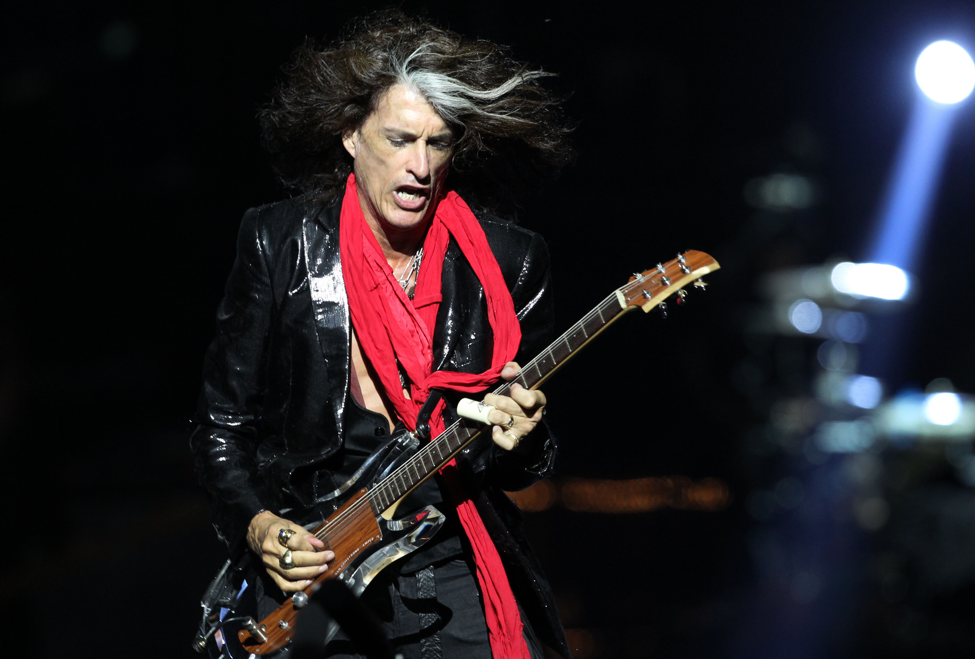 Lead guitarist Joe Perry, of American rock band Aerosmith, performs in Singapore on May 25, 2013. (Wong Maye-E—P)