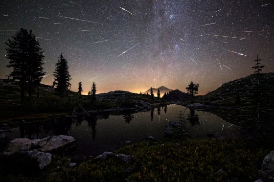 The Perseid Meteor Shower shoots across the sky in the early hours of Aug. 13, 2015, appearing to cascade from Mount Shasta in Calif., USA. The composite image features roughly 65 meteors captured by the photographer between 12:30am and 4:30am.